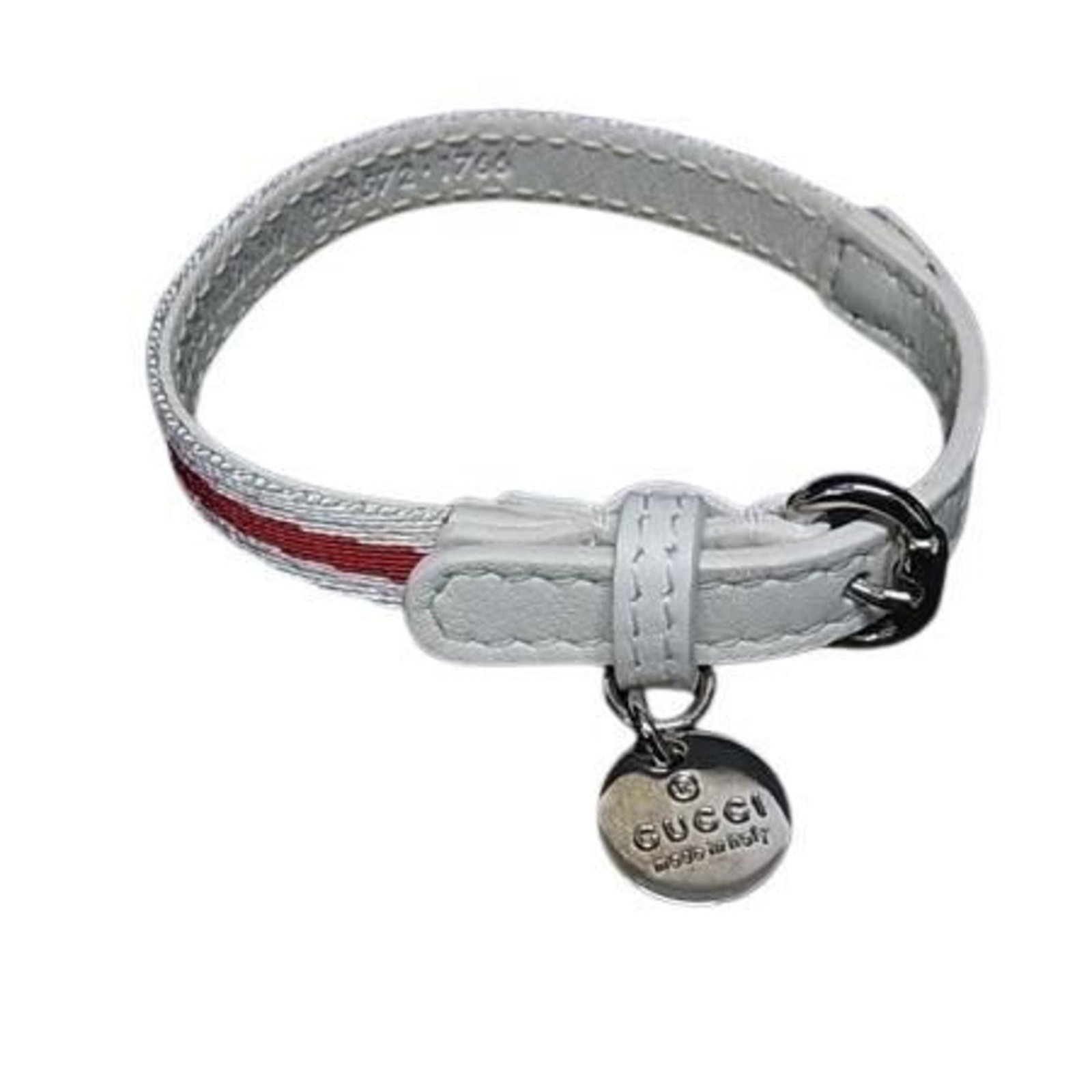 Canvas leather charm bracelet Gucci: Canvas leather charm bracelet Gucci Canvas leather charm bracelet from Gucci features bold red and white hues, with a sleek canvas and leather design. This fashion statement piece measures 17cm-20cm i