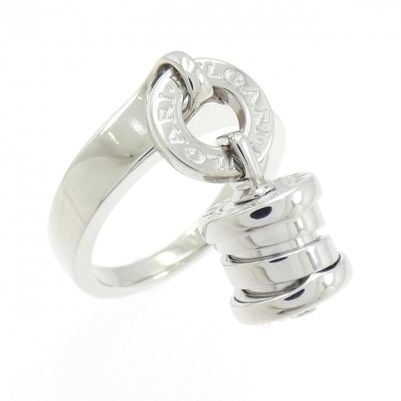 Bvlgari Band Ring White Gold (18K): Bvlgari Band Ring White Gold (18K) 18K White Gold Bvlgari Band Ring features a diamond stone, crafted in high-quality white gold. The ring has been worn and shows some signs of usage, including scratc