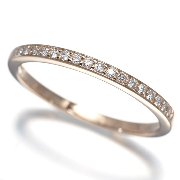 Diamond 0.13Ct Half Eternity Ring 18K 750 Rose Gold: Diamond 0.13Ct Half Eternity Ring 18K 750 Rose Gold Rose gold 18k metal, with natural diamond at the center, adorns this elegant half eternity ring. The 0.13ct diamond is set in a beautiful design