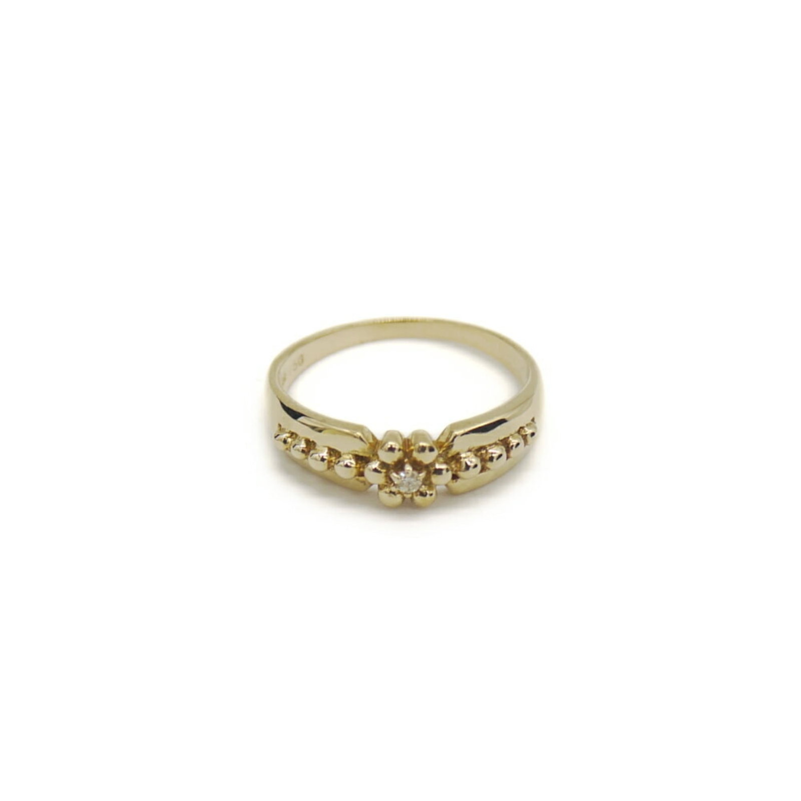 Christian Dior yellow gold band ring: Christian Dior yellow gold band ring Yellow gold band ring from Christian Dior, featuring a diamond stone and 18K yellow gold construction. The ring bears traces of usage and minor damages/dirt but