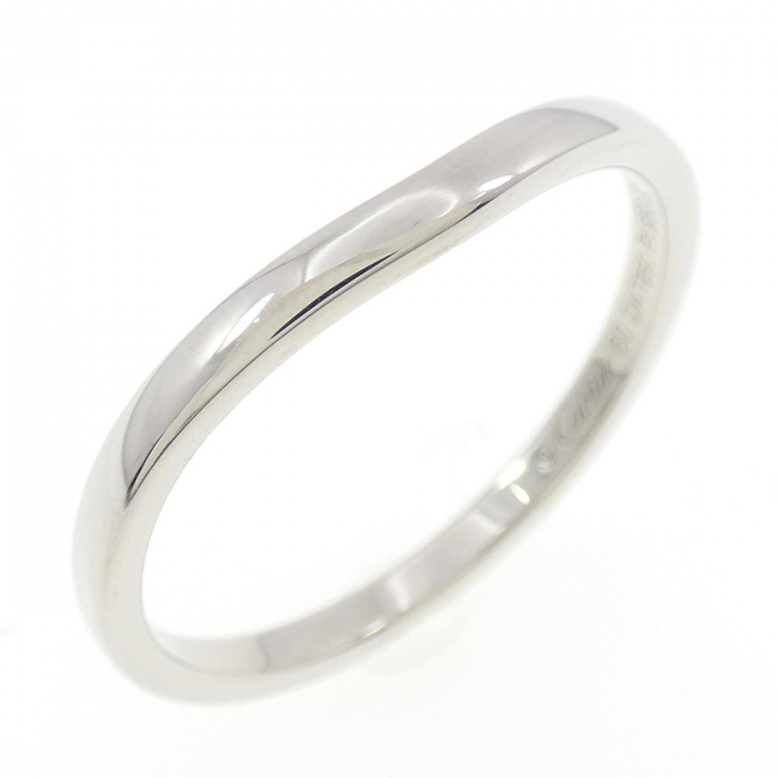 Ring Band by Platinum 950: Ring Band by Platinum 950 Platinum 950 Ring Band by Cartier, featuring a sleek and sophisticated design. Made from high-quality platinum material, this band boasts a refined look that complements