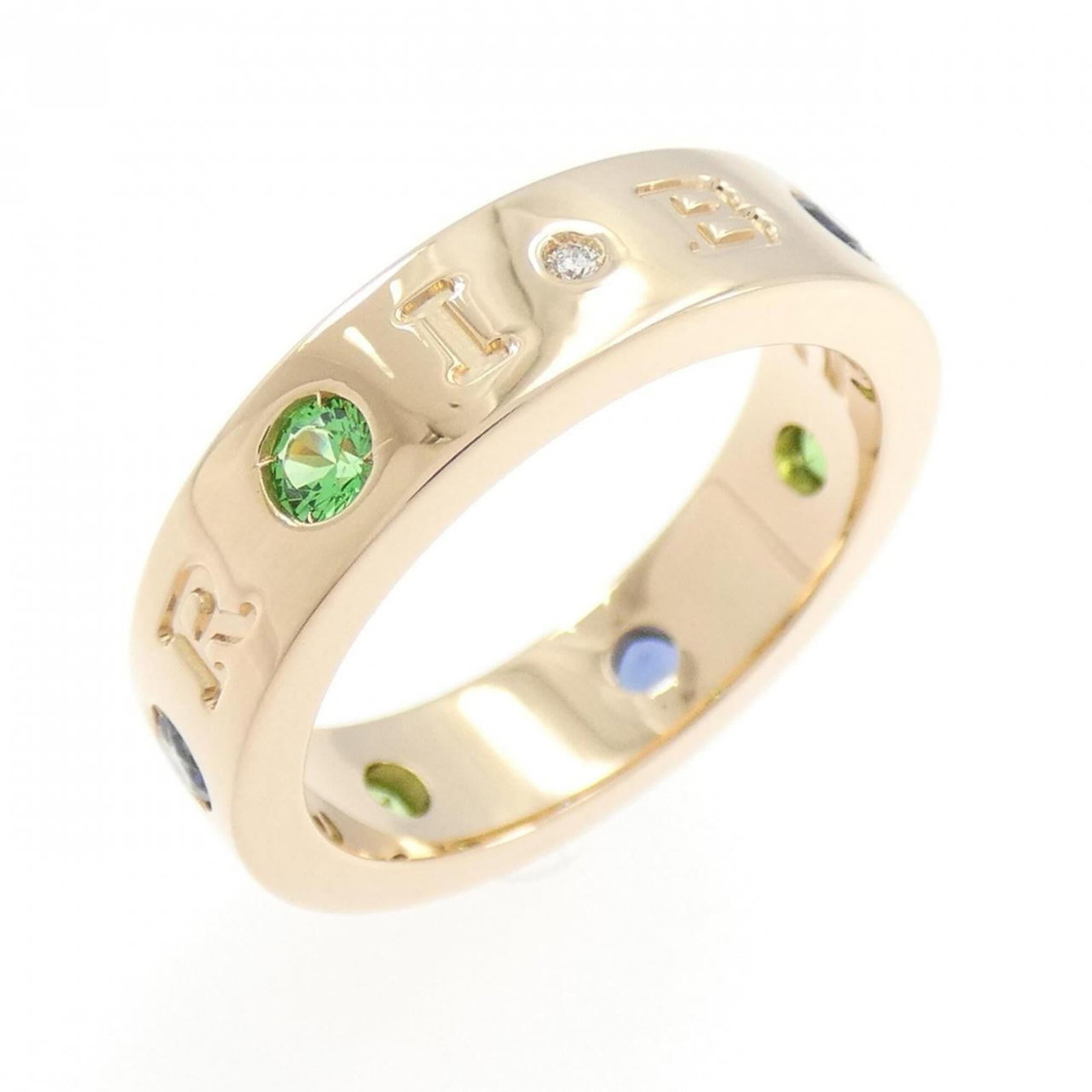 Pink Gold 18K Bvlgari Band Ring: Pink Gold 18K Bvlgari Band Ring Pink Gold 18K Bvlgari Band Ring features a stunning combination of pink gold and precious gemstones, including diamond, garnet, and sapphire. This beautiful ring boasts