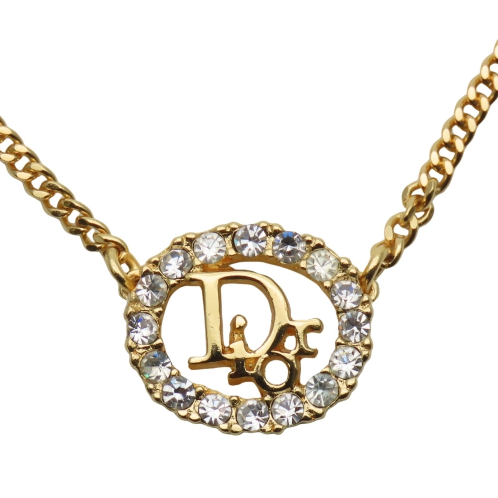 Christian Dior Cd Logo Metal Rhinestones Gold Plated Women's Necklace.: Christian Dior Cd Logo Metal Rhinestones Gold Plated Women's Necklace. Christian Dior's iconic Cd logo metal rhinestones gold plated women's necklace boasts a striking design with intricate details.