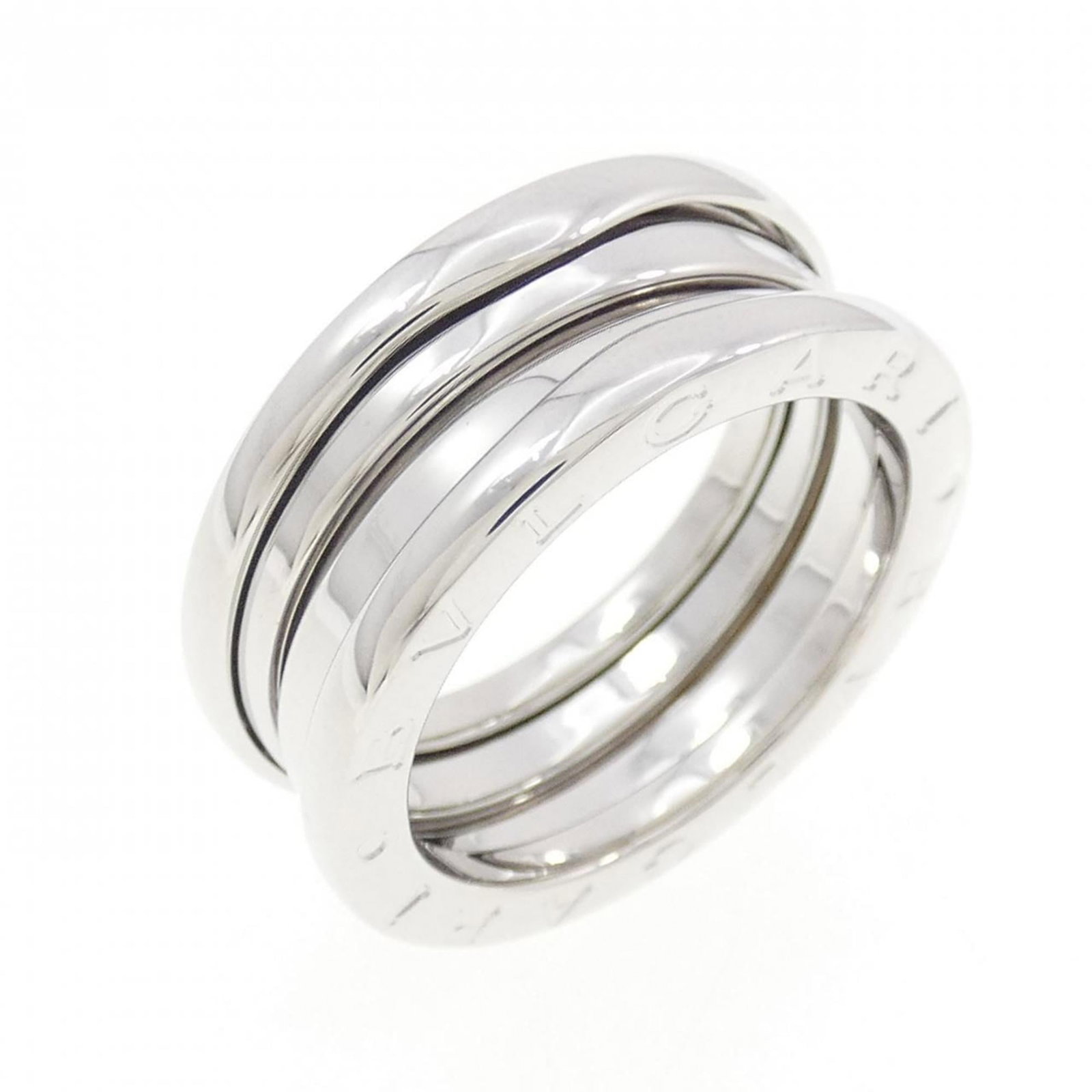 Bvlgari Band Ring White Gold (18K): Bvlgari Band Ring White Gold (18K) Bvlgari Band Ring White Gold (18K) features a sleek design made from high-quality white gold, available in a US size 6.5. This 18K band ring has been used and shows