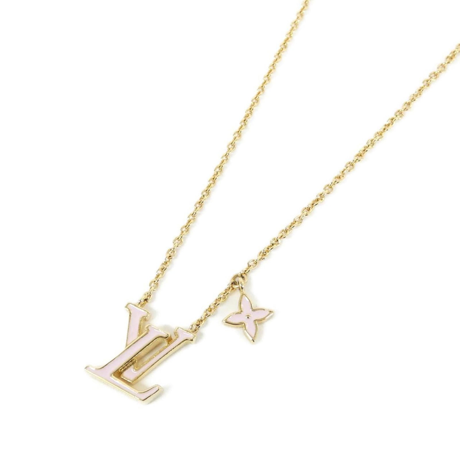 Lv Iconic Necklace Louis Vuitton M01215: Lv Iconic Necklace Louis Vuitton M01215 Gold and pink hues shine in this iconic Louis Vuitton necklace, featuring a 15mm x 12mm pendant suspended from a chain that fits necks 40 cm - 46 cm. The