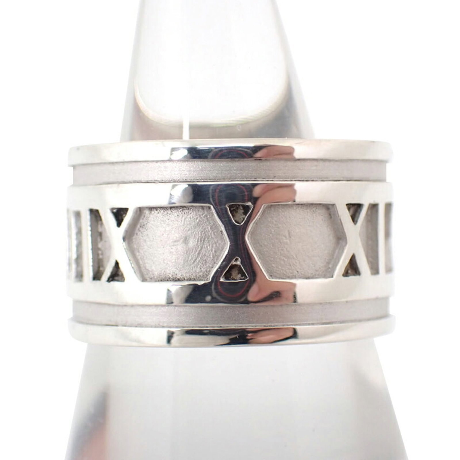 Sterling Silver Ring Tiffany Band: Sterling Silver Ring Tiffany Band Sterling silver ring with a classic Tiffany band design, featuring a subtle width and comfortable fit. The ring bears a few traces of usage, including minor