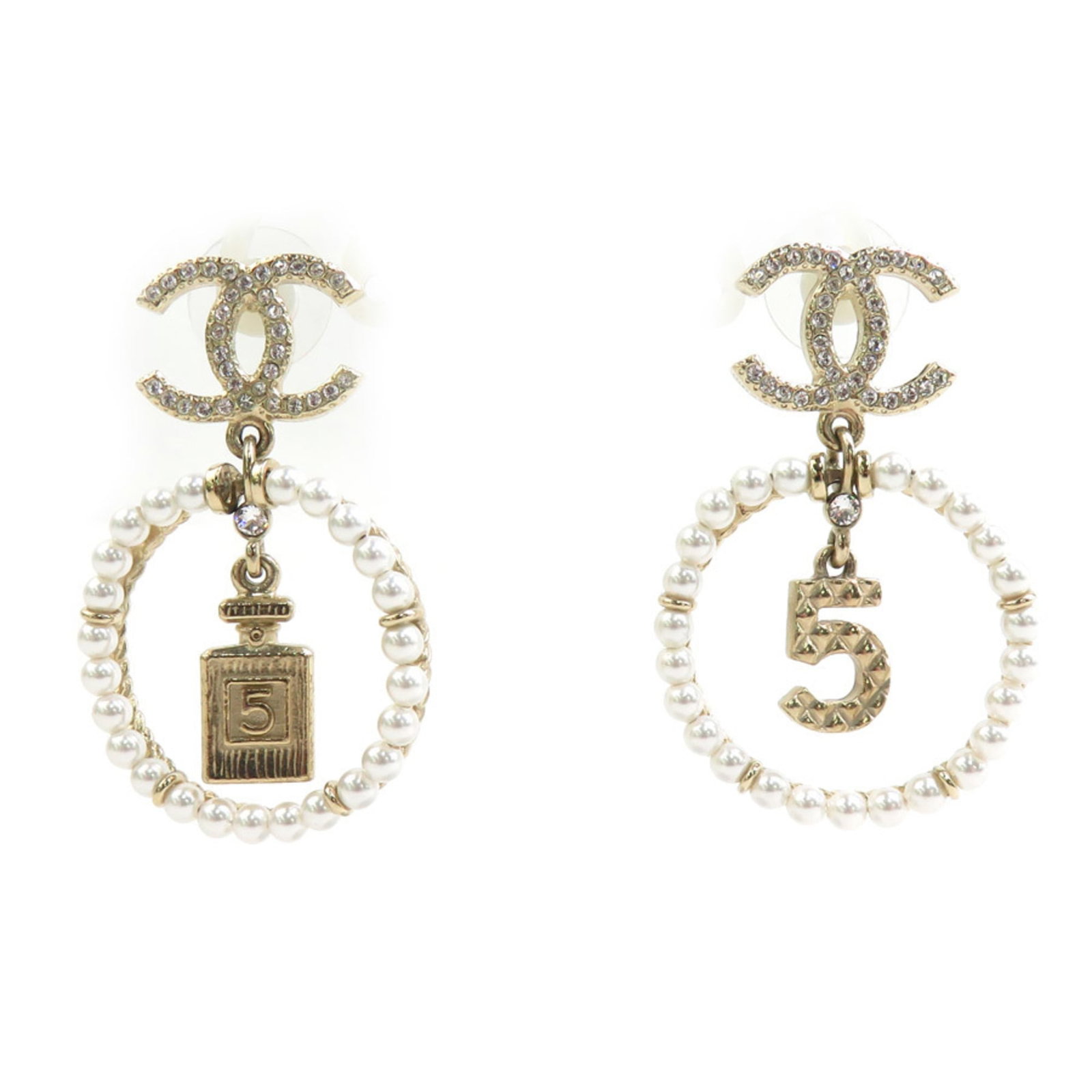 Stud Earrings Metal by Chanel: Stud Earrings Metal by Chanel Gold stud earrings from Chanel with a classic design, featuring a subtle metal finish. The earrings have a small size and are made of metal material. They show some signs