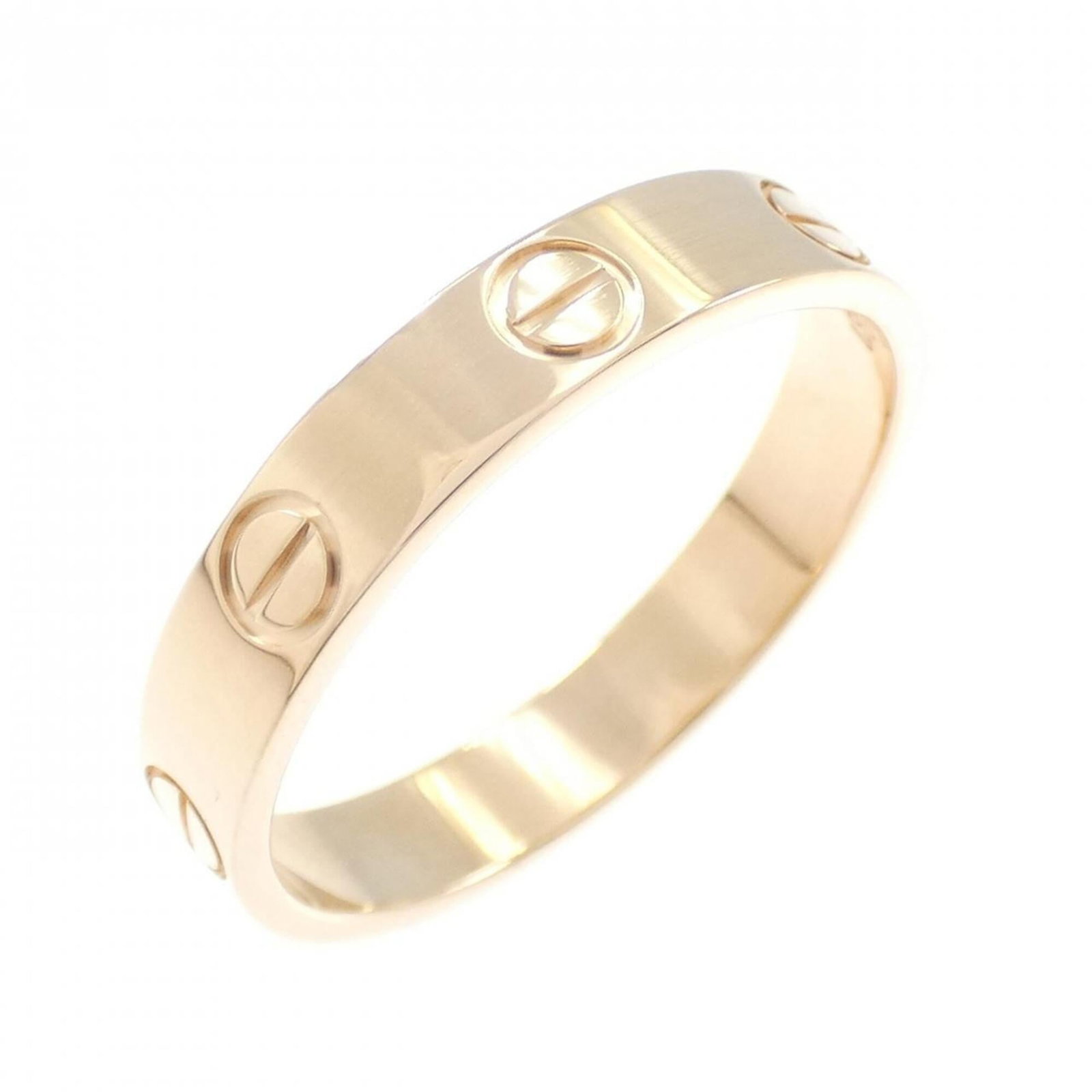 Pink gold 18k ring band from Cartier: Pink gold 18k ring band from Cartier Pink gold 18k ring band from Cartier, featuring a classic design with subtle traces of usage and minor scratches. The band's pink hue adds a touch of elegance to