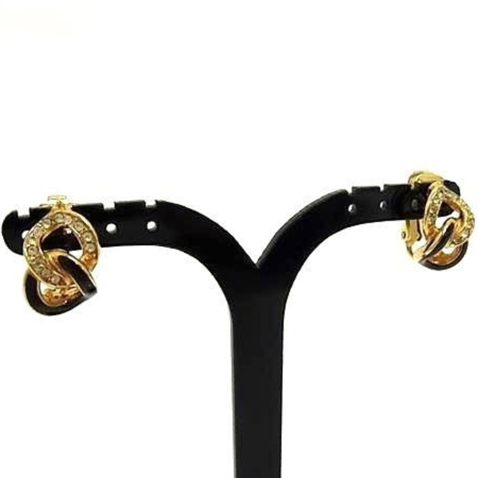 Stud Earrings by Metal from Christian Dior: Stud Earrings by Metal from Christian Dior Stud earrings by Christian Dior in black and gold metal, featuring a sleek design with a few traces of usage visible. The earrings have some minor scratches