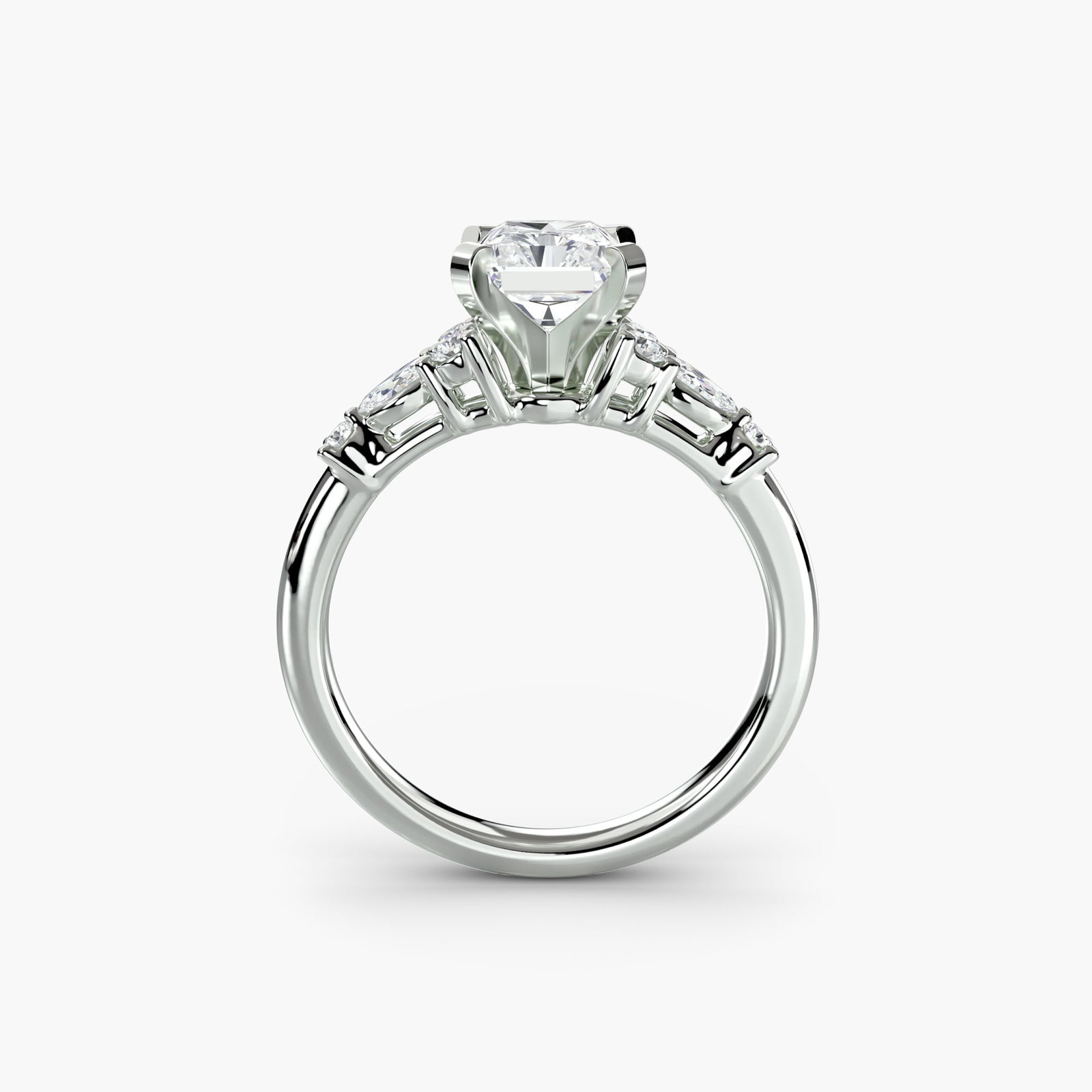 Side Stone Radiant 14Kt White Gold Ring Setting: Side Stone Radiant 14Kt White Gold Ring Setting Radiant setting showcases eight lab-grown stones totaling 0.22 carats in EF/VS clarity and color, set within a new 14Kt white gold ring with a band