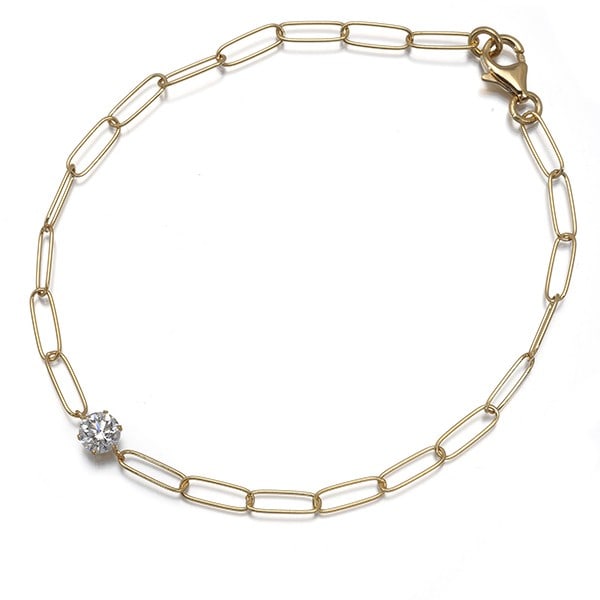 Diamond 0.42Ct Solitaire Clip Chain Bracelet 18K 750 Yellow Gold: Diamond 0.42Ct Solitaire Clip Chain Bracelet 18K 750 Yellow Gold 18k yellow gold chain bracelet features a natural diamond solitaire, weighing 0.42 carats, set in a classic clip chain design. The 18k