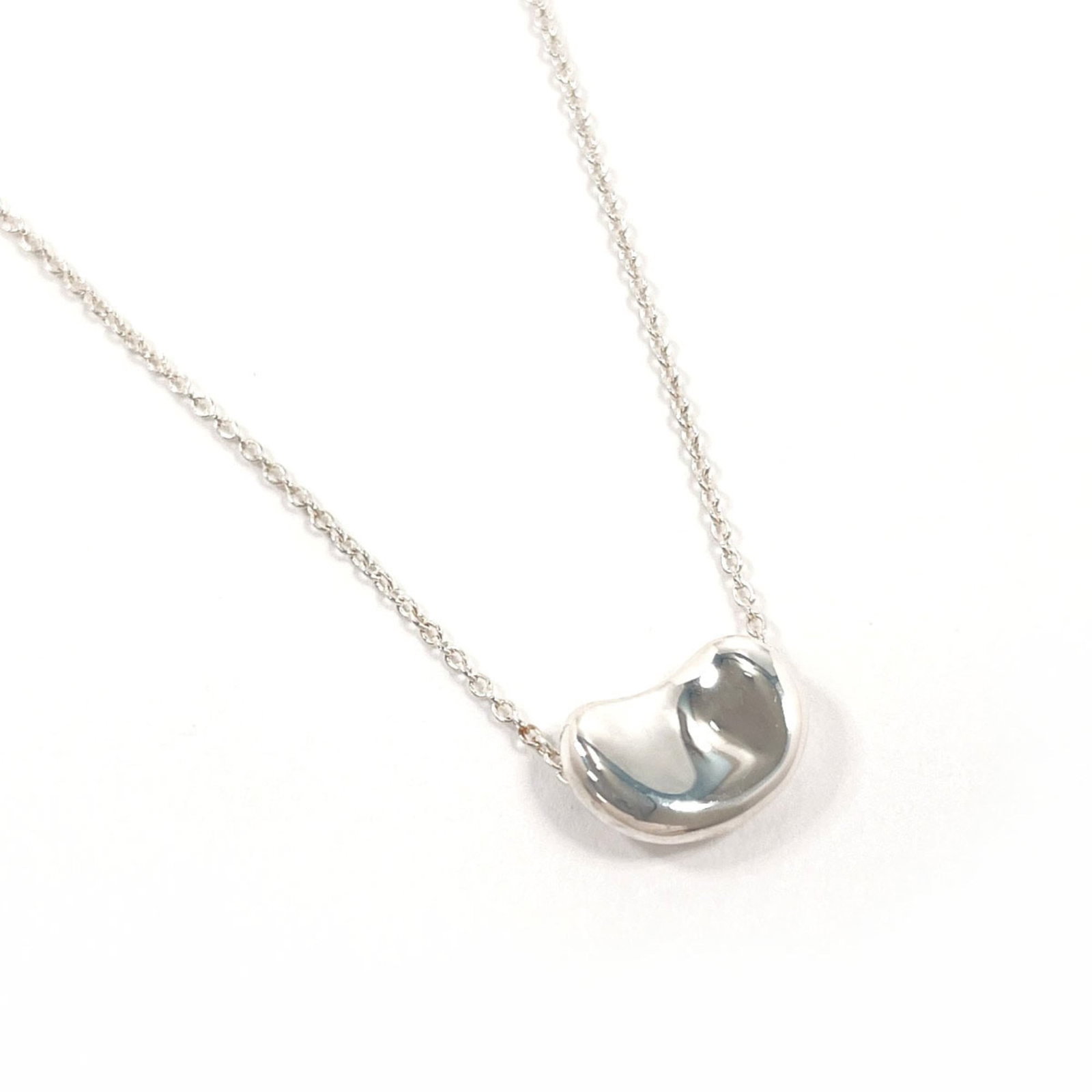 Tiffany & Co. Tiffany Bean Elsa Peretti Necklace 925 Sterling Silver Women'S: Tiffany & Co. Tiffany Bean Elsa Peretti Necklace 925 Sterling Silver Women'S Tiffany & Co. Tiffany Bean Elsa Peretti Necklace in sterling silver, featuring a 11mm x 7.5mm pendant with a classic design