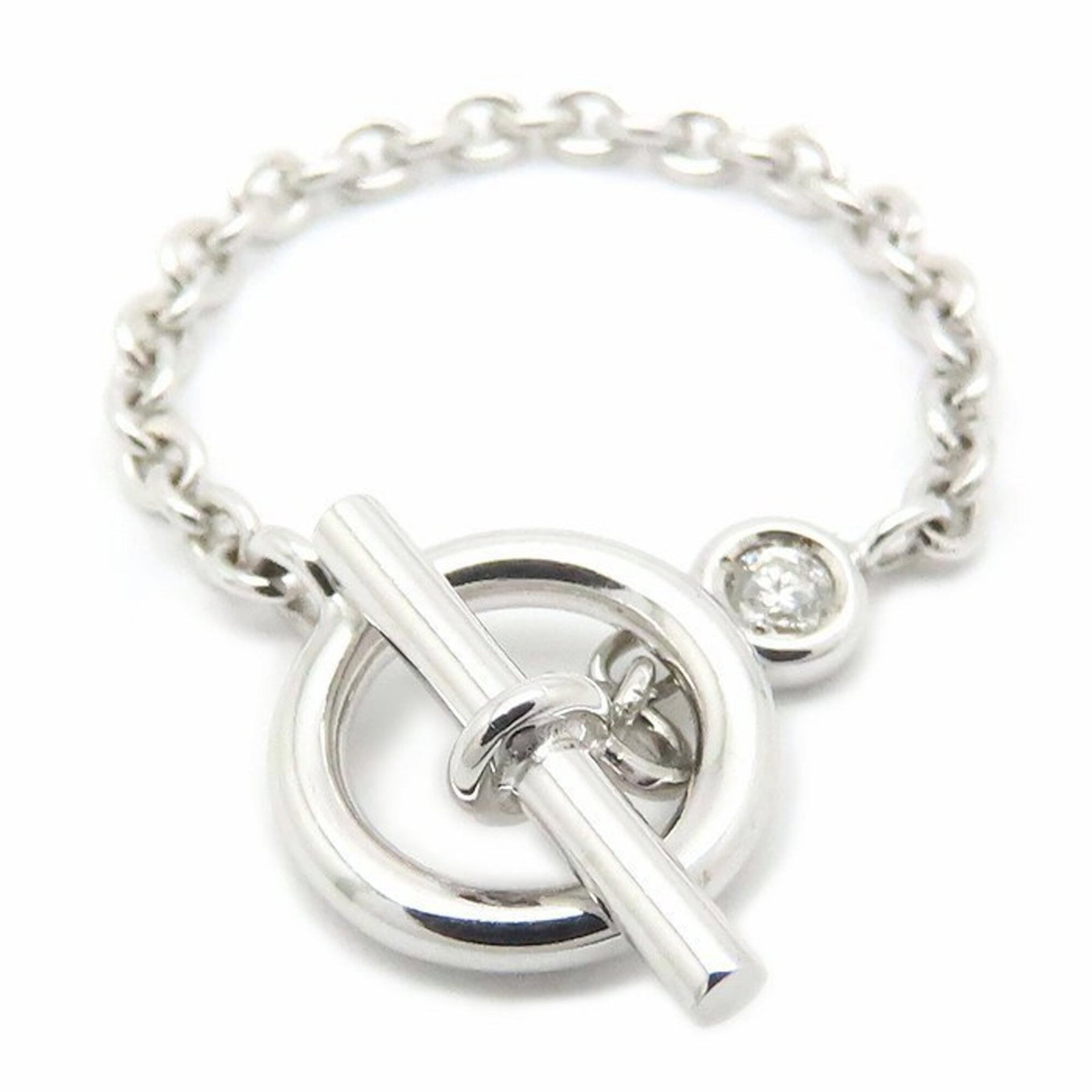 Hermes Band Ring White Gold (18K): Hermes Band Ring White Gold (18K) White gold band ring from Hermes, featuring 18K material and a size 6.5 fit. This used item shows hardly any signs of wear, making it a great option for those looking