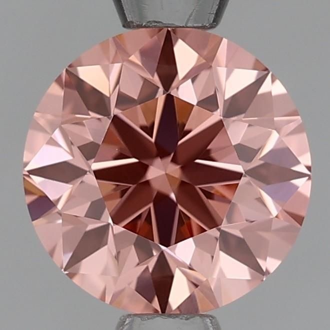 Round 1.01ct Fancy Orangey Pink VVS2 - Loose Lab Diamond: Round 1.01ct Fancy Orangey Pink VVS2 - Loose Lab Diamond Item Specifics: Source: This Is A Real Diamond Grown In A Lab Not Mined. Carat: 1.01 Cut: VG Color: Fancy Orangey Pink Clarity: VVS2 Polish: VG