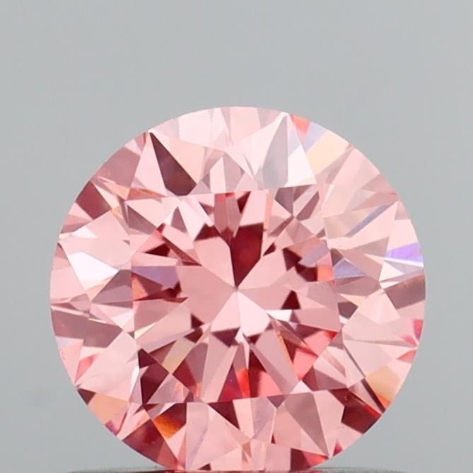 IGI Round 0.73ct Fancy Vivid Pink VVS2 - Loose Lab Diamond: IGI Round 0.73ct Fancy Vivid Pink VVS2 - Loose Lab Diamond Item Specifics: Source: This Is A Real Diamond Grown In A Lab Not Mined. Carat: 0.73 Cut: VG Color: Fancy Vivid Pink Clarity: VVS2 Polish: GD
