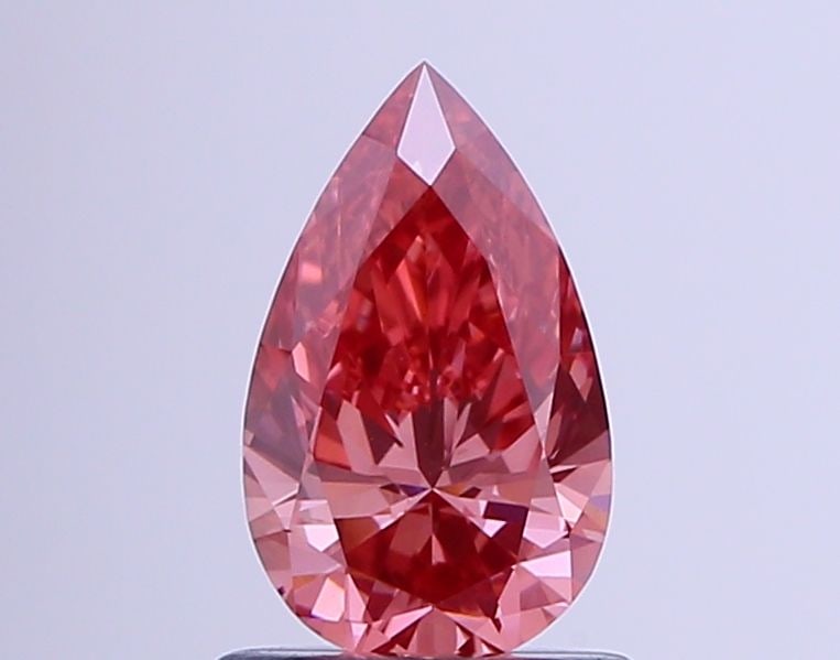 IGI Pear 0.72ct Fancy Vivid Pink VVS2 - Loose Lab Diamond: IGI Pear 0.72ct Fancy Vivid Pink VVS2 - Loose Lab Diamond Item Specifics: Source: This Is A Real Diamond Grown In A Lab Not Mined. Carat: 0.72 Cut: - Color: Fancy Vivid Pink Clarity: VVS2 Polish: VG S