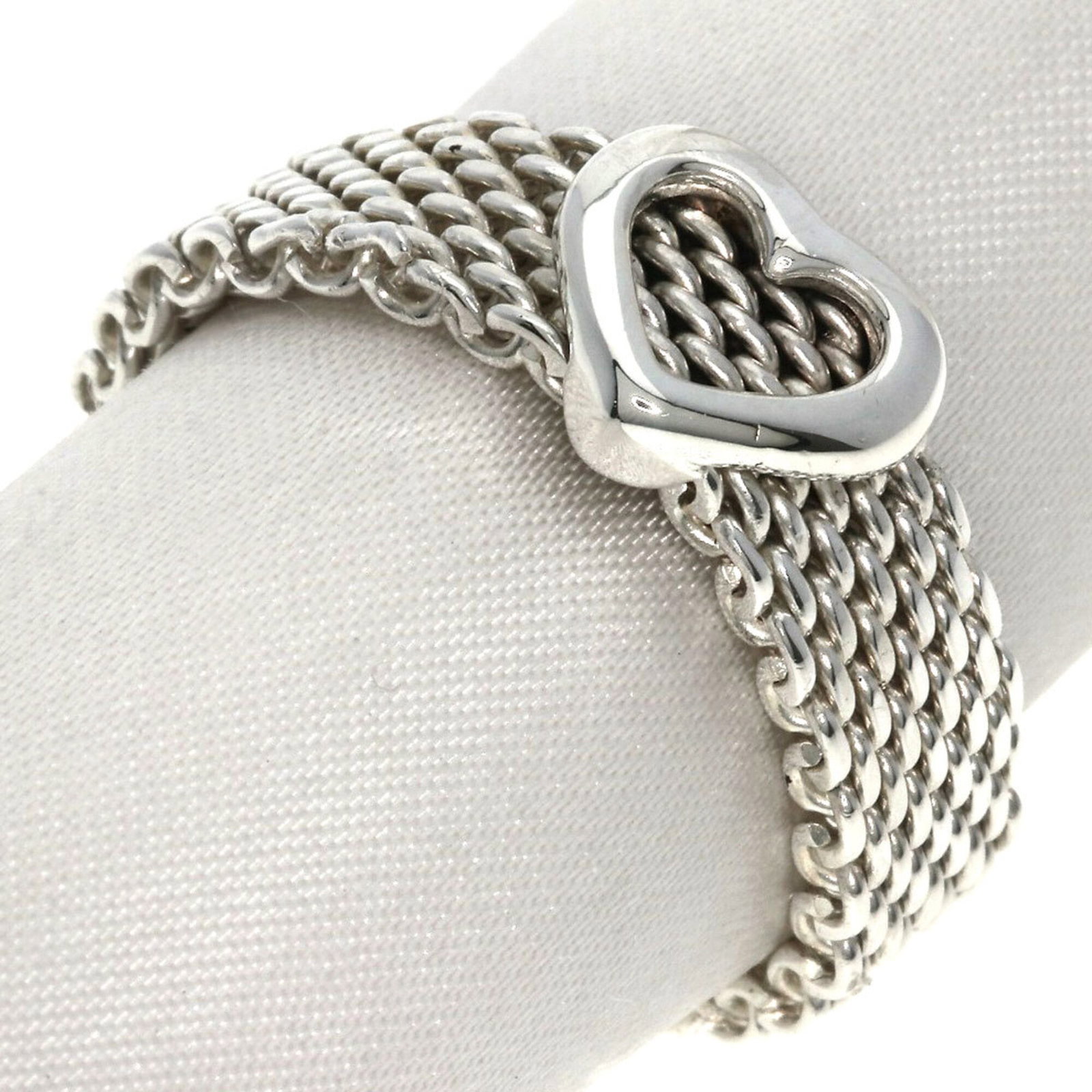 Silver Ring Tiffany Band: Silver Ring Tiffany Band Silver Ring Tiffany Band - A Like New, High-Quality Silver Band with a Classic Design. This women's band ring features a silver material and a unique design that makes it
