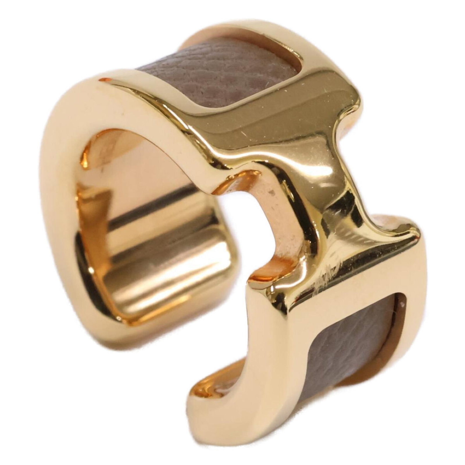 Hermes Earcuff Metal: Hermes Earcuff Metal Ercuff metal from the iconic French fashion house, featuring a subtle Etoupe Gray tone. This used item boasts a few traces of usage and minor scratches, yet remains in very good c