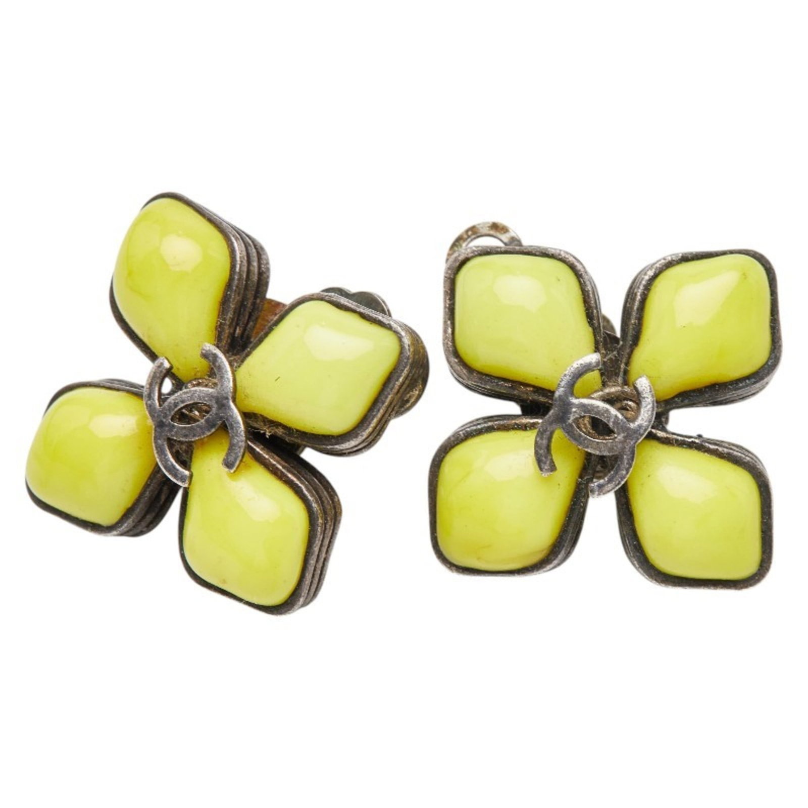 Enamel Metal Clip Chanel Earrings: Enamel Metal Clip Chanel Earrings Black and yellow enamel metal clip earrings from the iconic Chanel brand, featuring a classic design with subtle scratches and signs of usage. The enamel finish remai