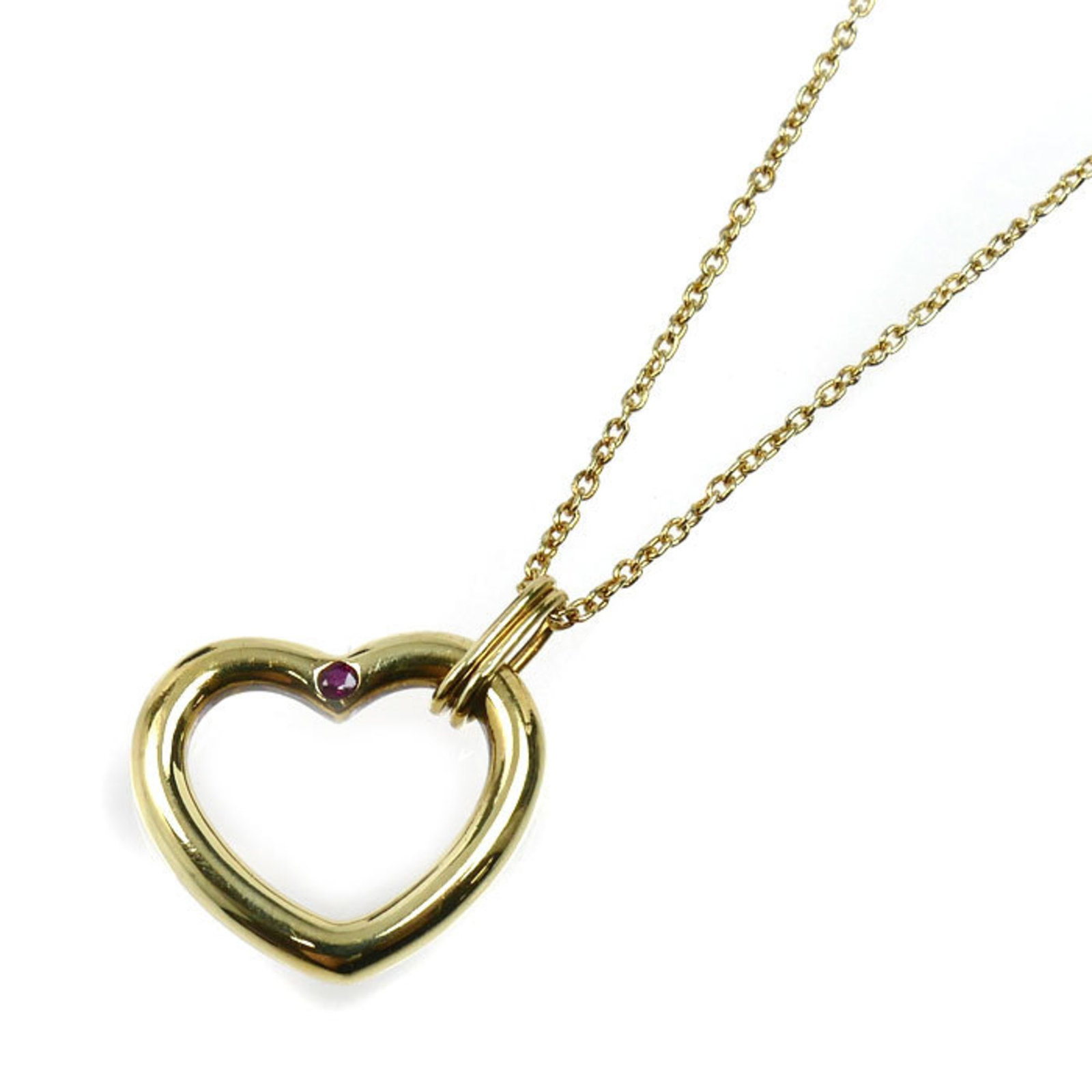 Tiffany & Co. 18K Yellow Gold Open Heart Ruby Necklace 4.0G 43Cm Women'S: Tiffany & Co. 18K Yellow Gold Open Heart Ruby Necklace 4.0G 43Cm Women'S 18K Yellow Gold Open Heart Ruby Necklace in Excellent Condition. This stunning necklace features an open heart pendant set