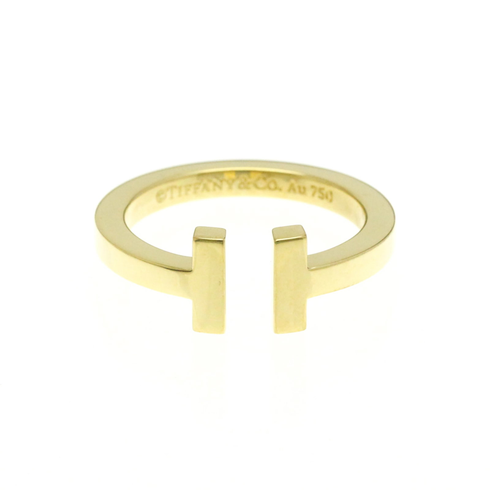 Tiffany Ring Gold Yellow 18K: Tiffany Ring Gold Yellow 18K Tiffany Ring Gold Yellow 18K - A Timeless Fashion Statement. This 18k yellow gold band ring, bearing the iconic Tiffany brand, boasts a sleek and sophisticated design with