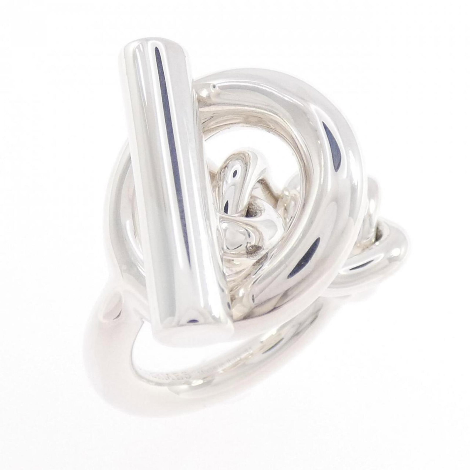 Ring Hermes Silver Band 925: Ring Hermes Silver Band 925 Silver band ring from Hermes, made from 925 sterling silver with a classic design. The ring bears some minor scratches and wear, but remains in very good condition