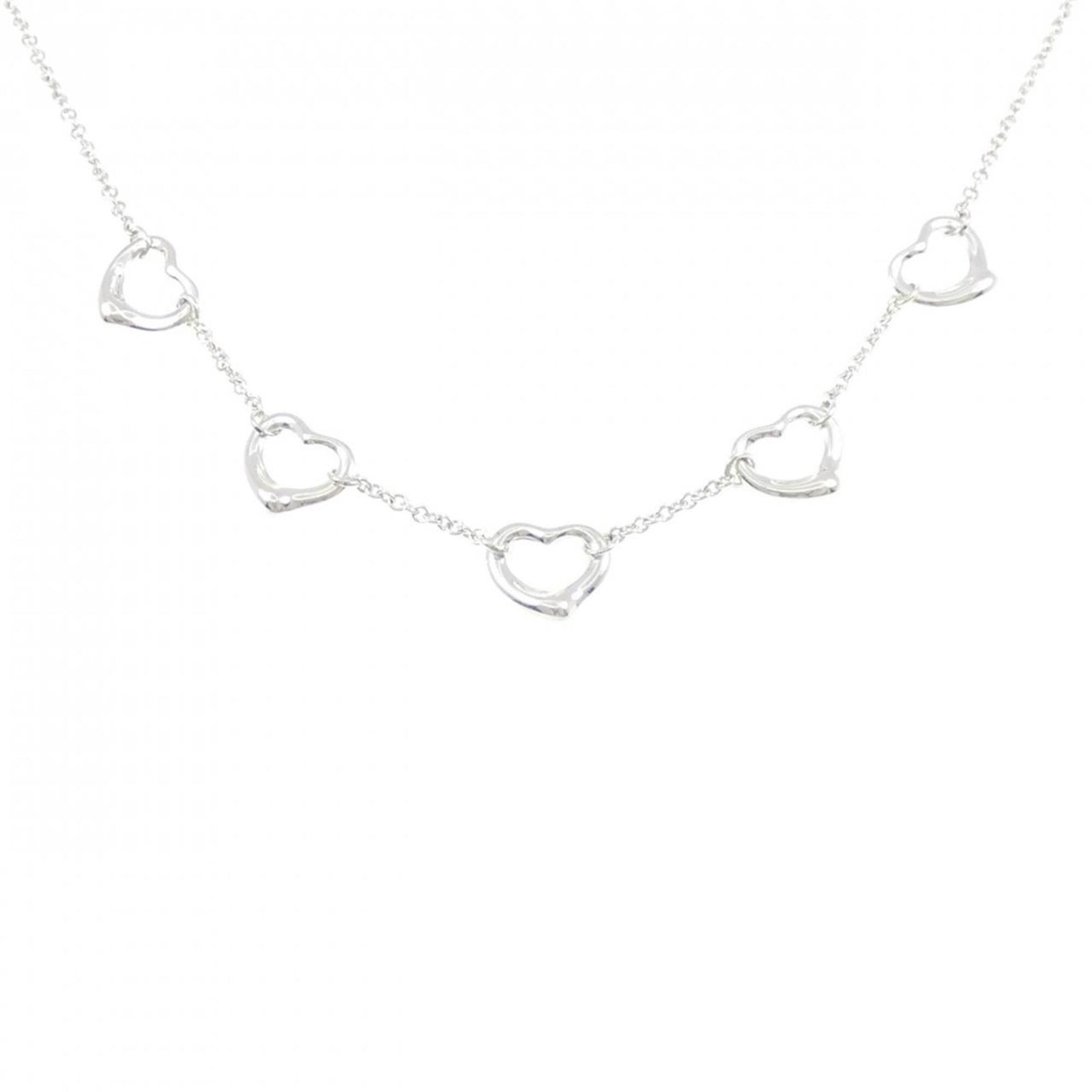 Tiffany Open Heart 5 Motif Necklace: Tiffany Open Heart 5 Motif Necklace The Tiffany Open Heart 5 Motif Necklace boasts an elegant design featuring five interconnected motifs, showcasing the brand's signature style. Made from sterling si