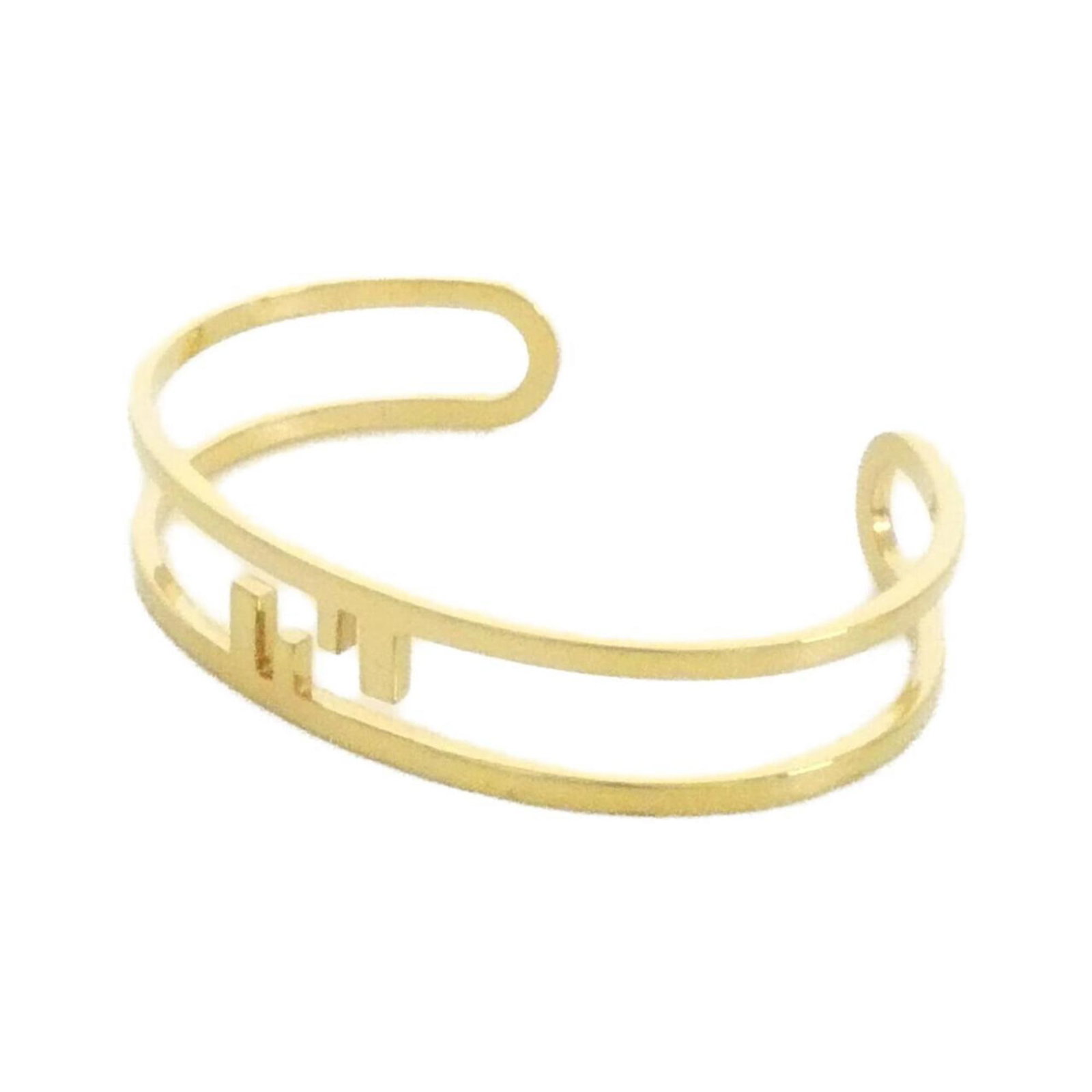 Fendi Bangle: Fendi Bangle A Fendi gold bangle in excellent condition, with a subtle wear and minor scratches, measures 17cm in length. The item bears the signature of the brand, reflecting its high-end craftsmansh