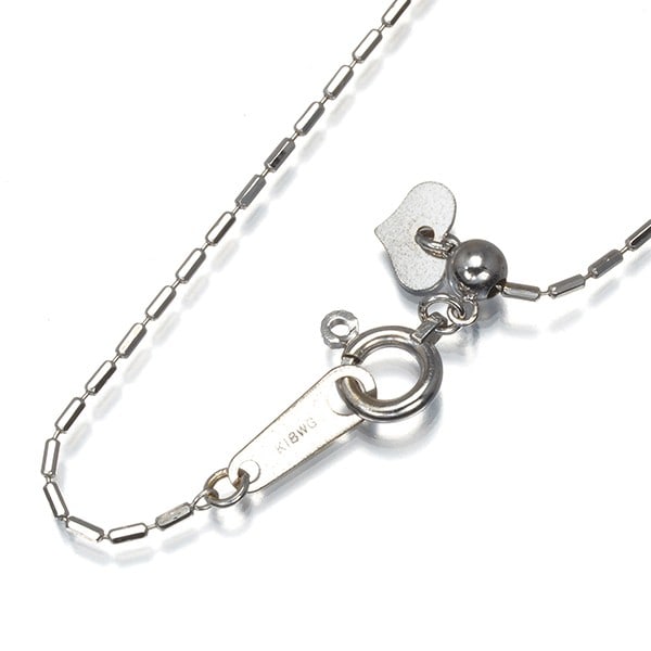 Chain cut cylinder necklace 45cm 18k white gold: Chain cut cylinder necklace 45cm 18k white gold 18k white gold chain cut cylinder necklace measures 45cm in length. This elegant design showcases the beauty of 18k white gold, with no main stone to