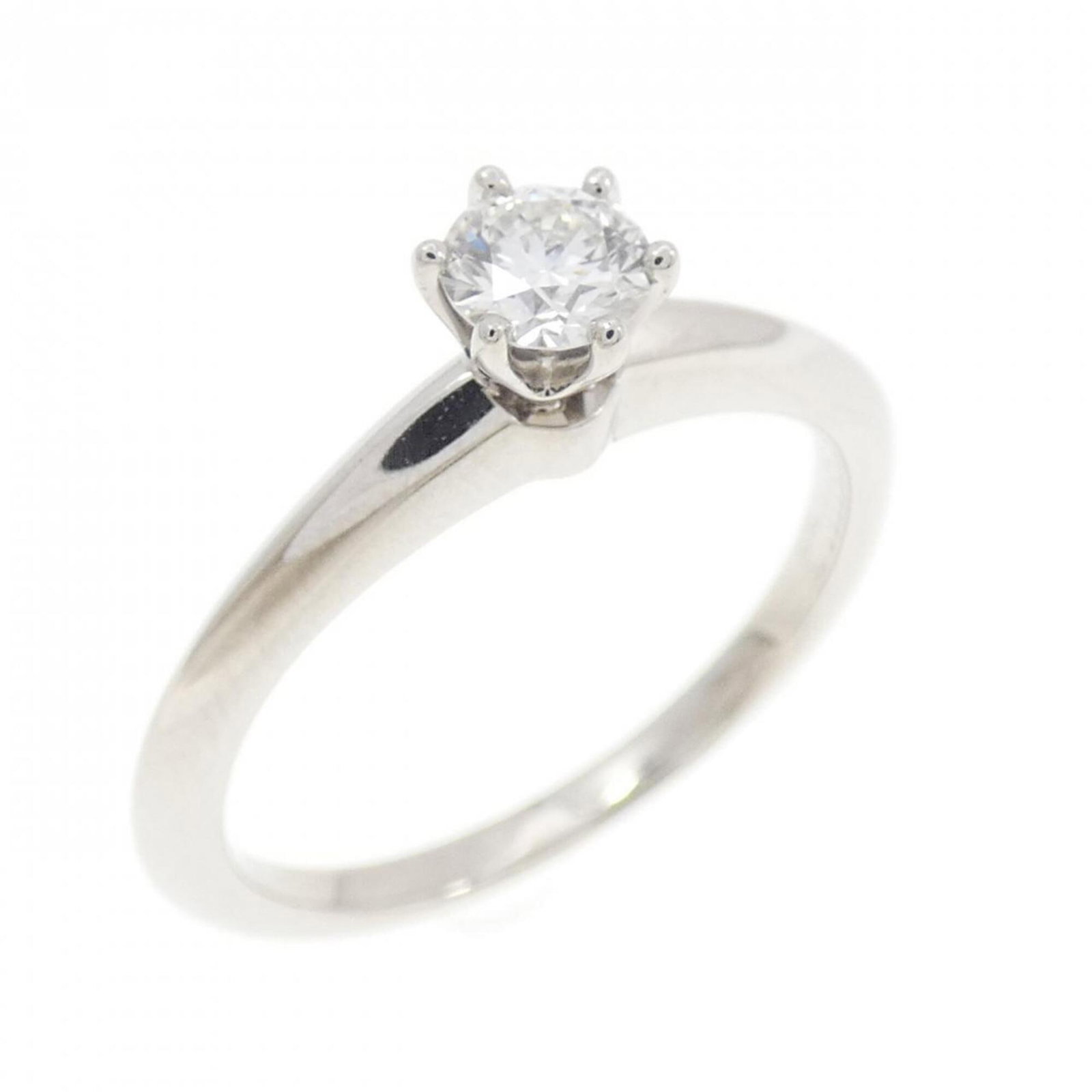 Platinum ring by Tiffany band: Platinum ring by Tiffany band Platinum ring by Tiffany features a diamond stone, available in women's size 6.5 and made from high-quality platinum material. The band ring has some minor scratches and 