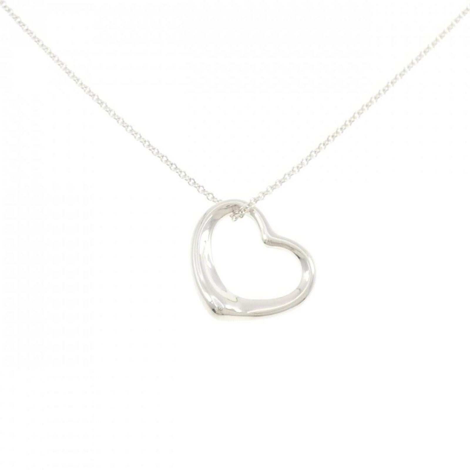 Heart Open Tiffany Necklace: Heart Open Tiffany Necklace The Heart Open Tiffany Necklace boasts a stunning silver pendant, measuring 20.7mm x 21.3mm, suspended from a 41 cm / 16.14'' chain. With its elegant design and subtle scra