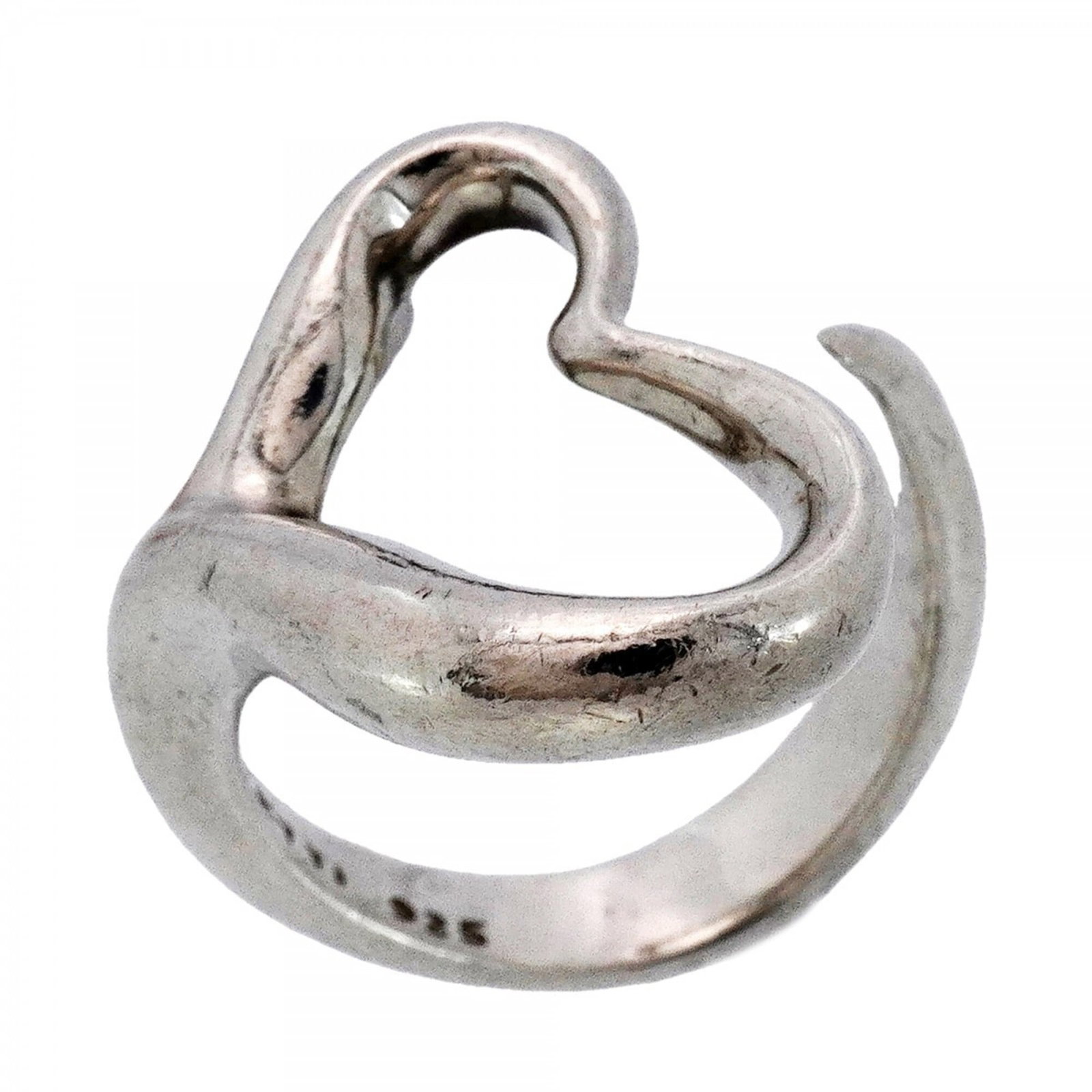 Tiffany Band Ring Silver 925: Tiffany Band Ring Silver 925 Silver 925 band ring from Tiffany, featuring a classic design with subtle wear and minor scratches. The item bears the brand's mark and is made from high-quality silver