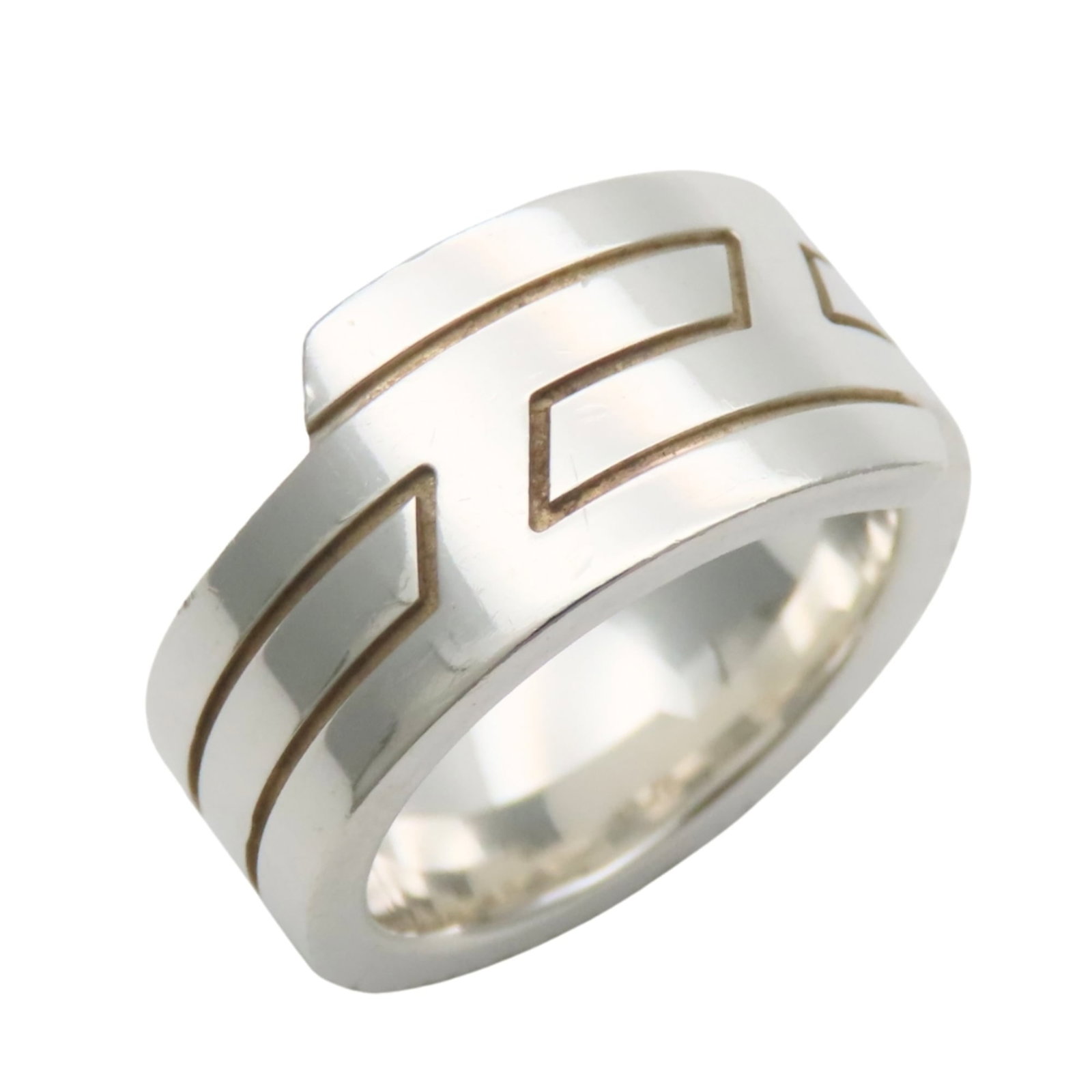 Ring Hermes Silver Band 925: Ring Hermes Silver Band 925 Silver band ring from Hermes, made from high-quality 925 silver. The ring features a classic design with a subtle sheen, showcasing the brand's signature style. With its