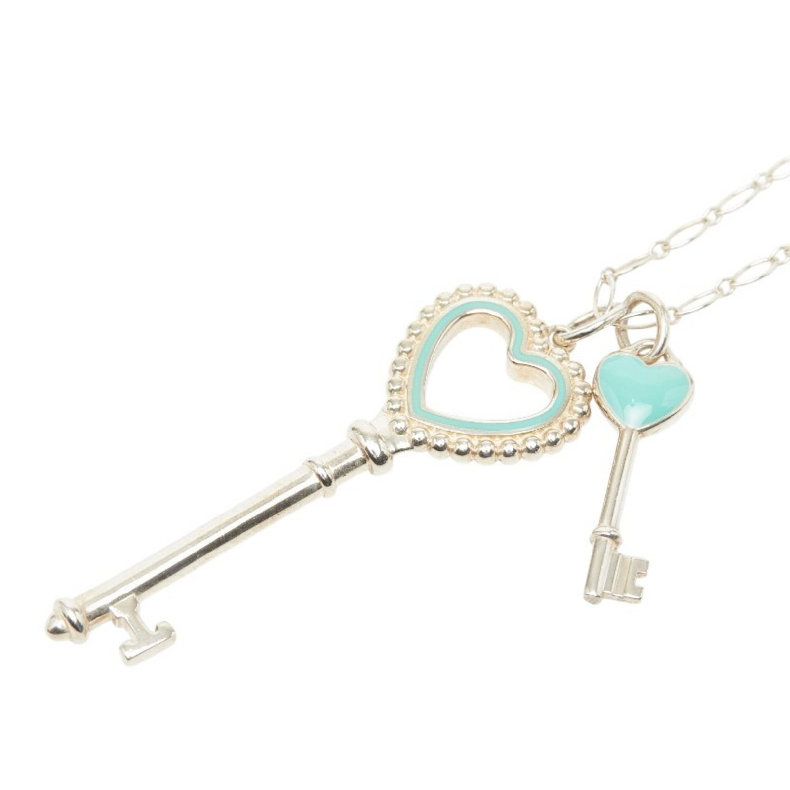 Heart Key Motif Long Necklace Tiffany Women'S Silver Blue Sv925 Enamel: Heart Key Motif Long Necklace Tiffany Women'S Silver Blue Sv925 Enamel Tiffany's iconic long necklace features an elegant heart key motif in striking blue and silver. Made from high-quality enamel and
