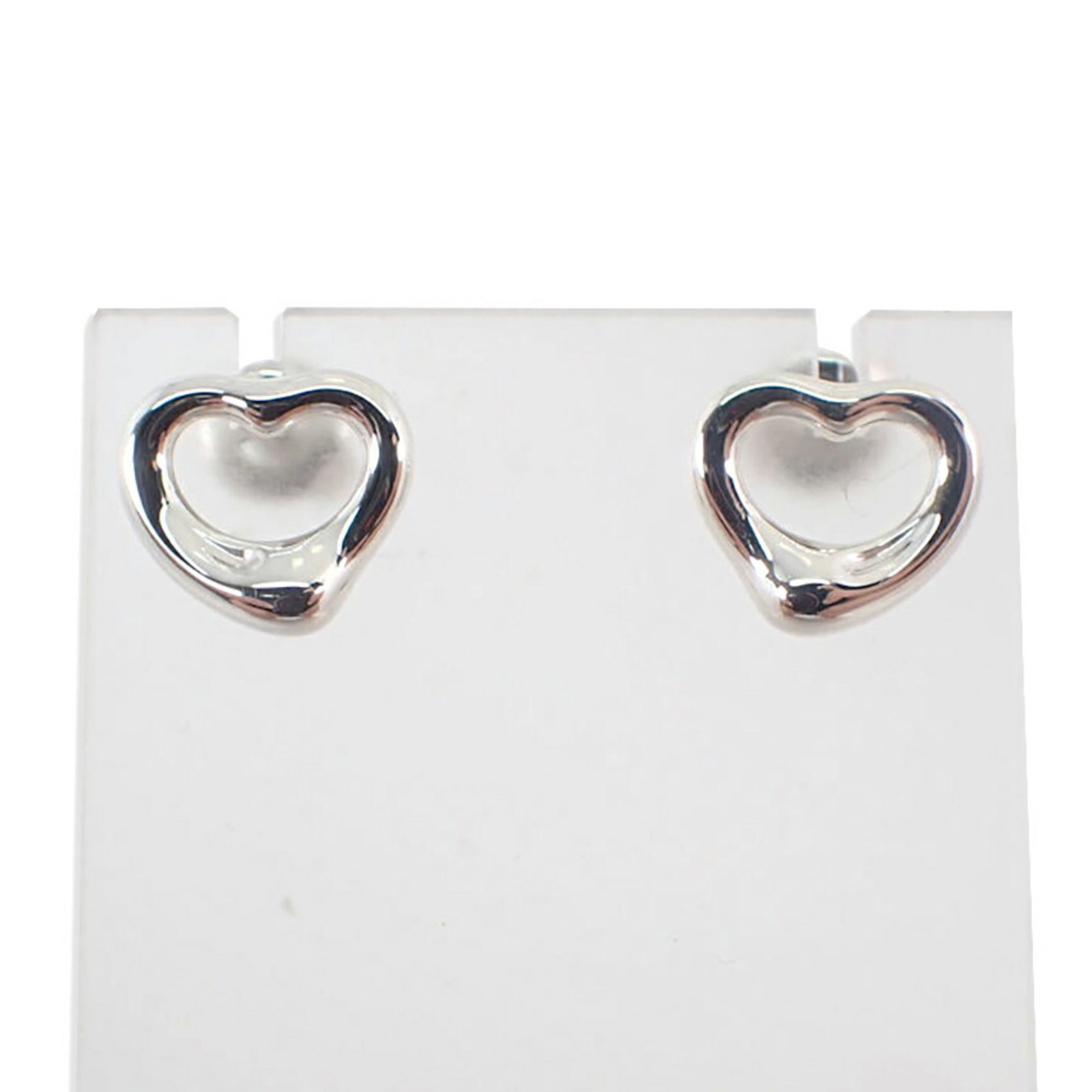 Sterling Silver Stud Earrings by Tiffany: Sterling Silver Stud Earrings by Tiffany Sterling Silver Stud Earrings by Tiffany - Like New Condition. Made from high-quality sterling silver, these stud earrings showcase the iconic style and