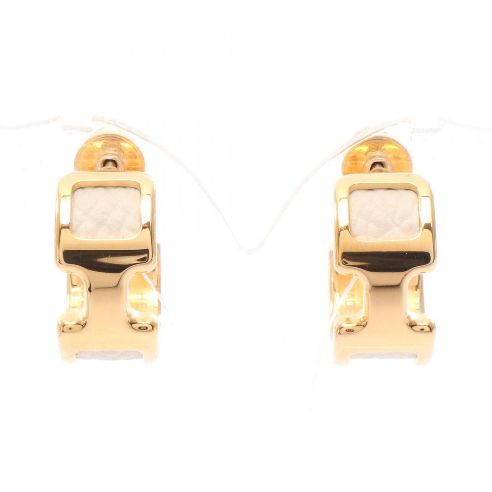 Hermes Hoop Earrings Epsom Leather Gold Plating: Hermes Hoop Earrings Epsom Leather Gold Plating Epsom leather and gold plating come together in these elegant Hermes hoop earrings, featuring a sleek design with a subtle shine. The gold plating adds 