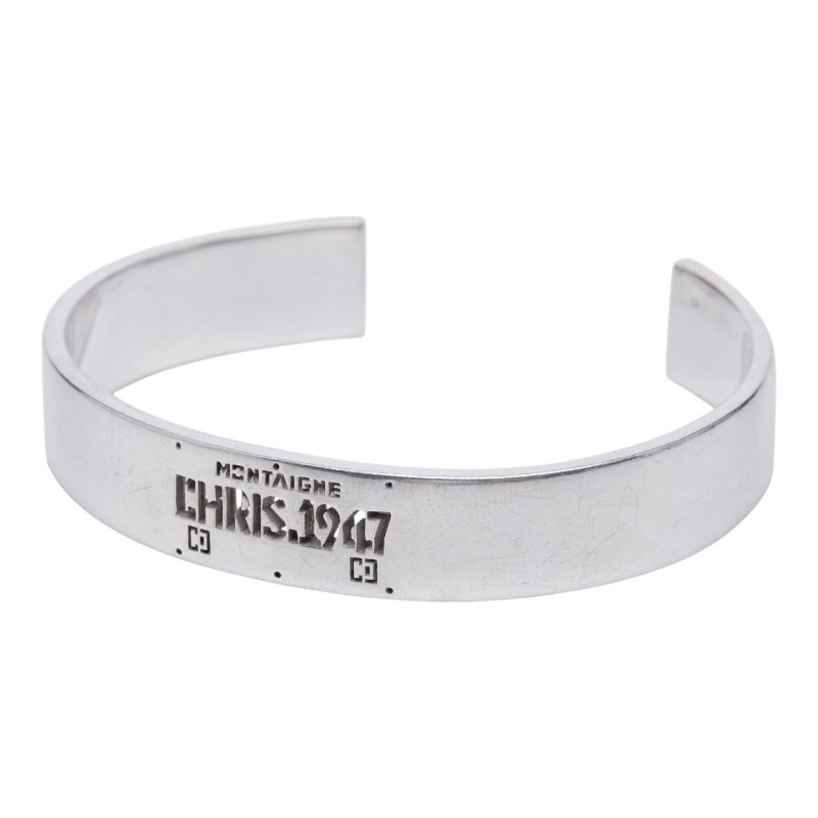 Silver bangle from Dior Christian: Silver bangle from Dior Christian Silver bangle from Dior Christian features a sleek design with subtle details, crafted from high-quality silver 925. With a length of 17.5cm, it adds a touch of elega