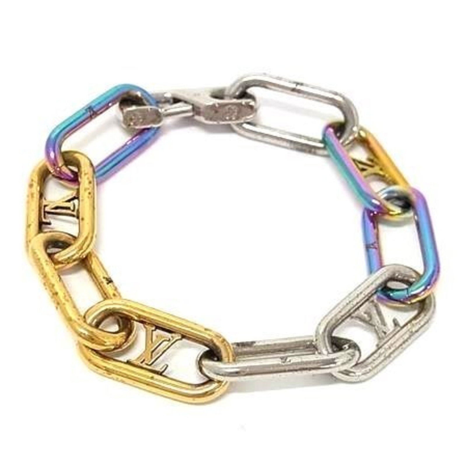Charm of Louis Vuitton Metal: Charm of Louis Vuitton Metal Multi-color metal charm from Louis Vuitton, measuring 20.5cm in length, bears traces of usage and minor scratches. The item's condition shows signs of wear but remains