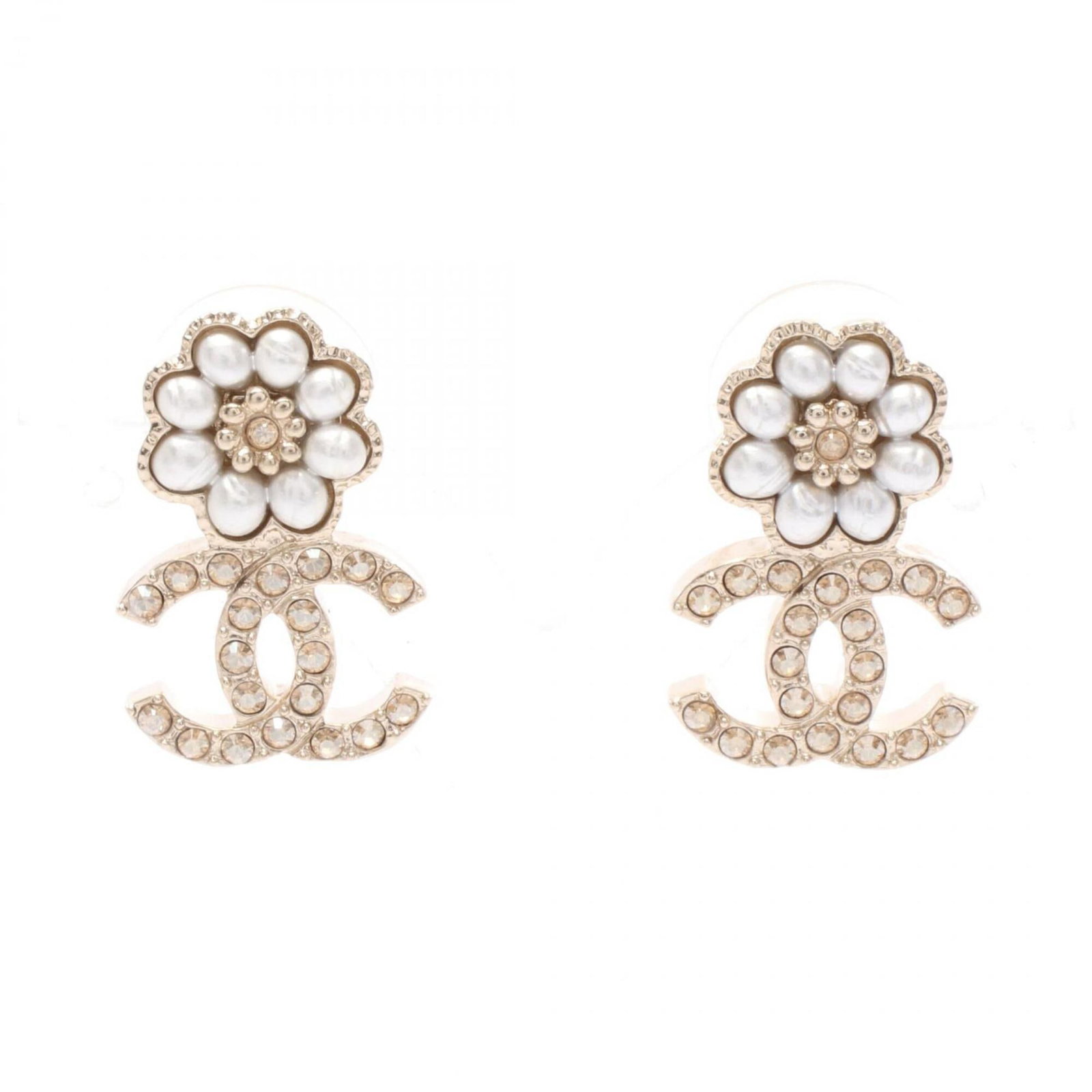 Chanel Stud Earrings: Chanel Stud Earrings Stunning Chanel stud earrings in gold plated finish, adorned with clear rhinestone stones. The delicate design adds a touch of sophistication to any outfit. In excellent condition