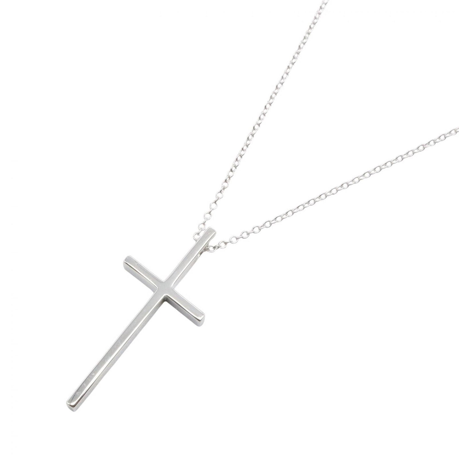 Tiffany & Co. Cross Necklace 18K White Gold (Wg) Women'S Silver Tone: Tiffany & Co. Cross Necklace 18K White Gold (Wg) Women'S Silver Tone 18K White Gold Cross Necklace with Silver Tone Accents, featuring a 30mm x 13mm pendant suspended from an 46cm chain. This Tiffany 