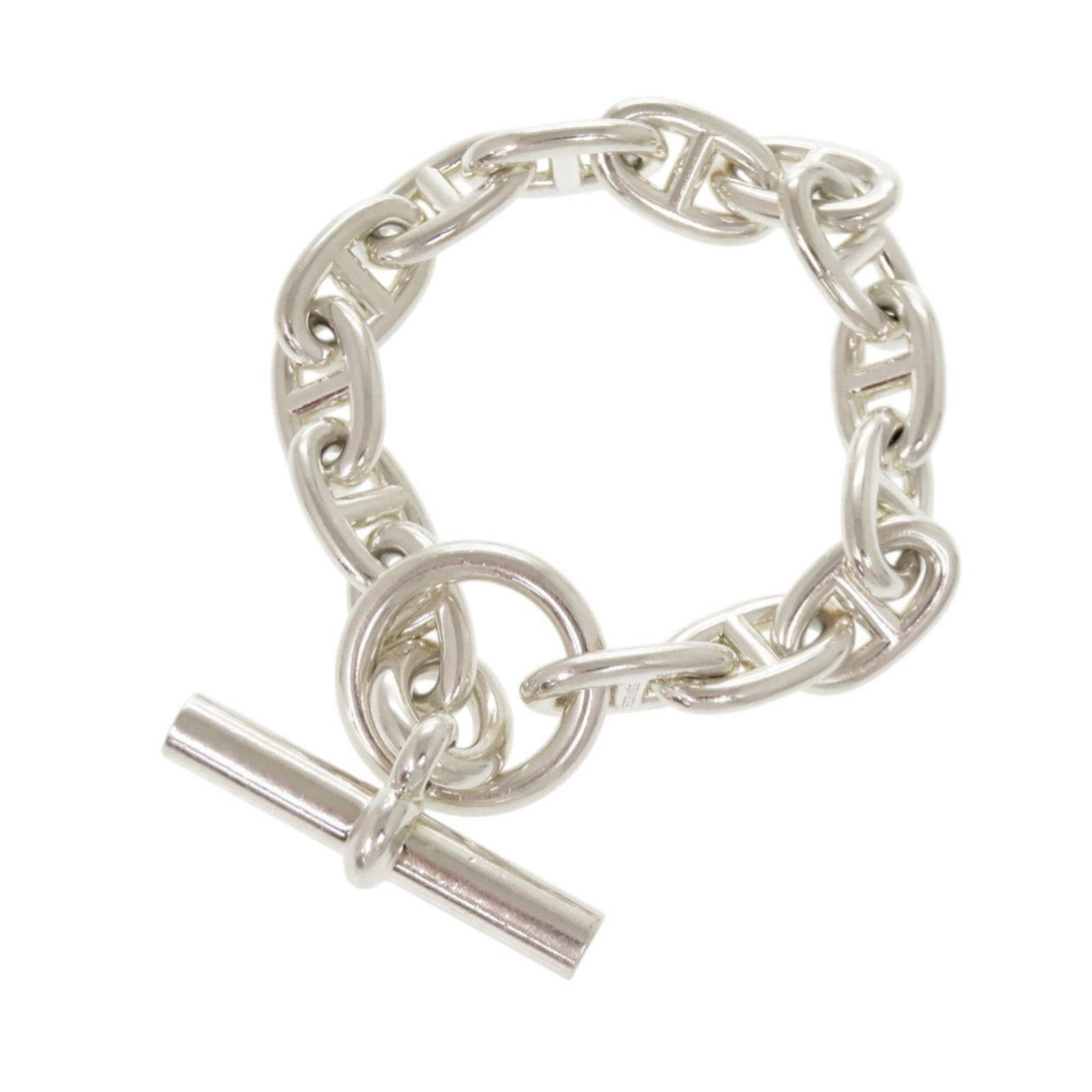 Silver Charm Bracelet 925 by Hermes: Silver Charm Bracelet 925 by Hermes Silver Charm Bracelet by Hermes, crafted from high-quality silver (925), features a sleek and sophisticated design. Measuring 19cm in length, this versatile charm