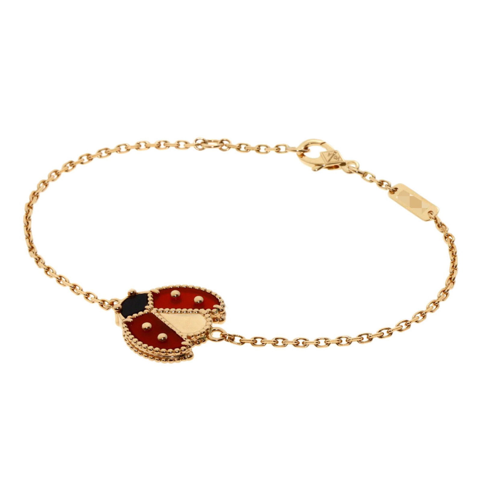 Pink Gold 18K Van Cleef Arpels Charm Bracelet: Pink Gold 18K Van Cleef Arpels Charm Bracelet Pink Gold 18K Van Cleef Arpels Charm Bracelet features a delicate pink gold chain adorned with two vibrant stones, carnelian and onyx. The bracelet boasts