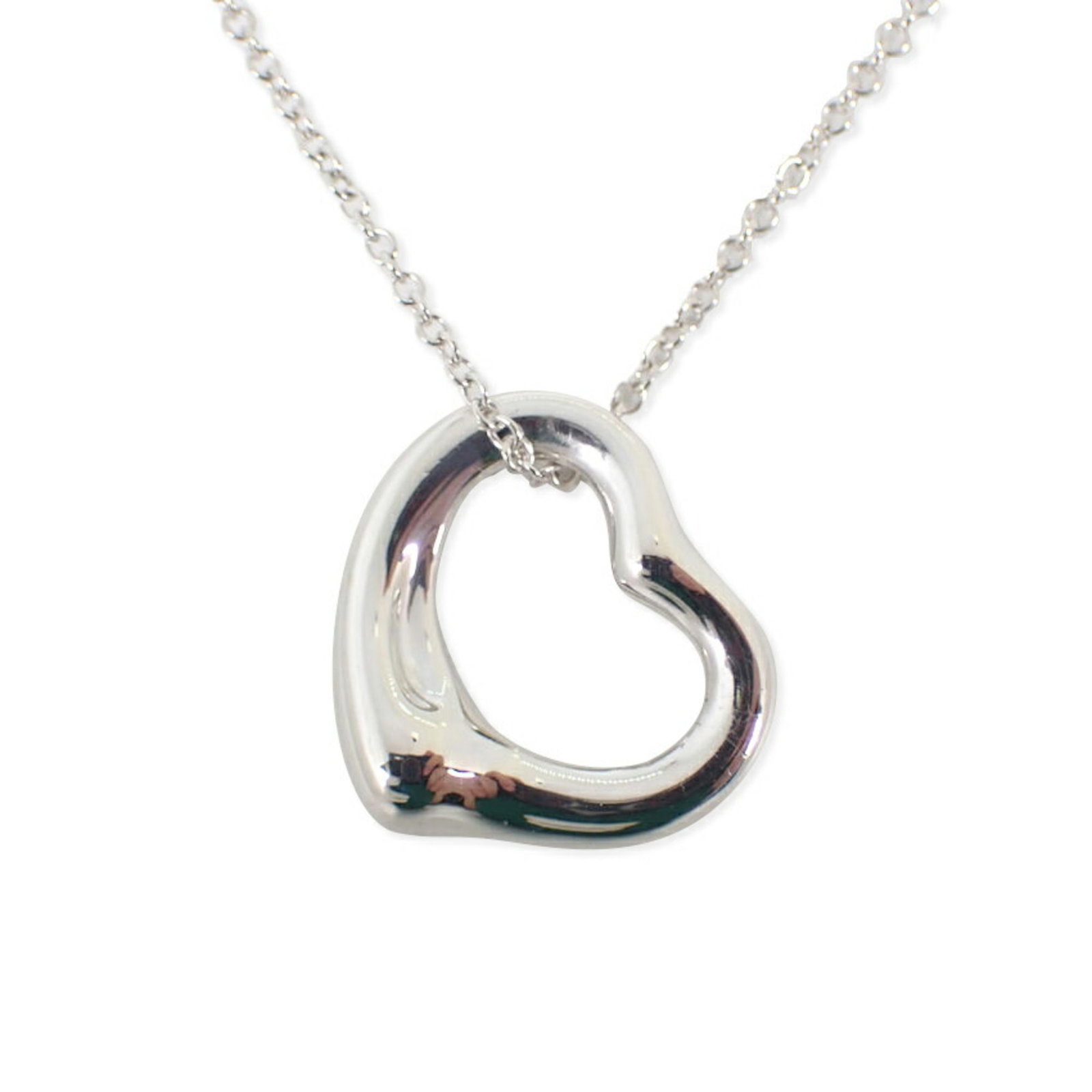 Tiffany 925 Heart Pendant Necklace: Tiffany 925 Heart Pendant Necklace Sterling silver Tiffany necklace with a heart pendant, featuring a 14mm x 15.5mm design on a 40.5 cm chain. The piece bears some signs of usage, including scratches