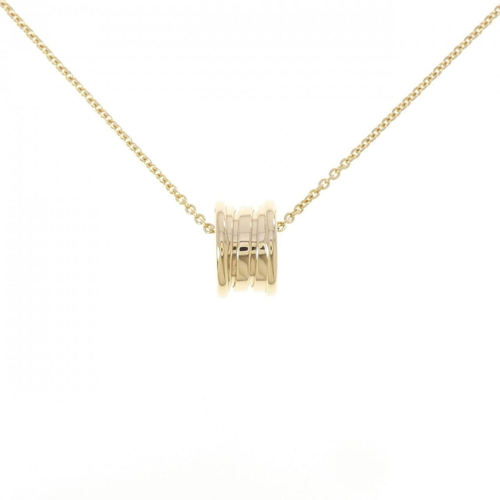 Bvlgari B.Zero1 Necklace: Bvlgari B.Zero1 Necklace Yellow gold (18K) Bvlgari B.Zero1 Necklace, featuring a pendant with dimensions of 14.7mm x 8.8mm, is available for purchase in used condition. The necklace has a 41 cm / 16.1