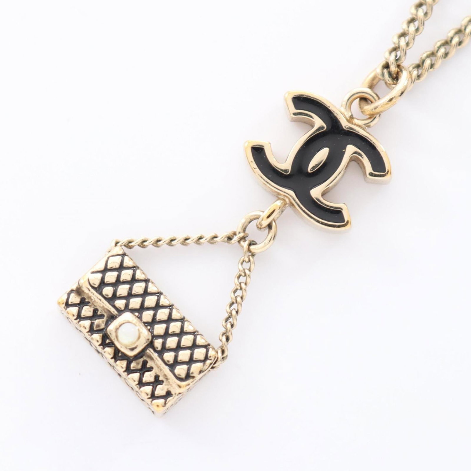 Women's Coco Chanel Mark Necklace Plated Gold Matelasse Black: Women's Coco Chanel Mark Necklace Plated Gold Matelasse Black Gold plated Matelasse black necklace from Chanel, featuring a 26mm x 11mm pendant. This used necklace has a gold plating finish and