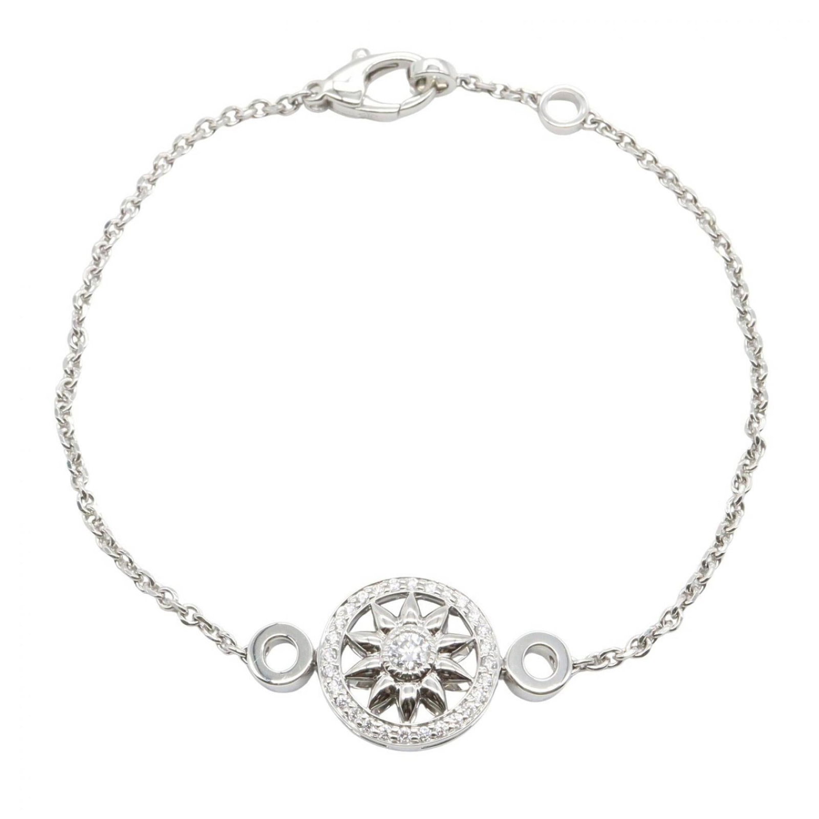 Harry Winston Platinum Charm Bracelet: Harry Winston Platinum Charm Bracelet Platinum charm bracelet from Harry Winston, featuring clear and silver details. Made from high-quality platinum, this delicate charm bracelet showcases a refined