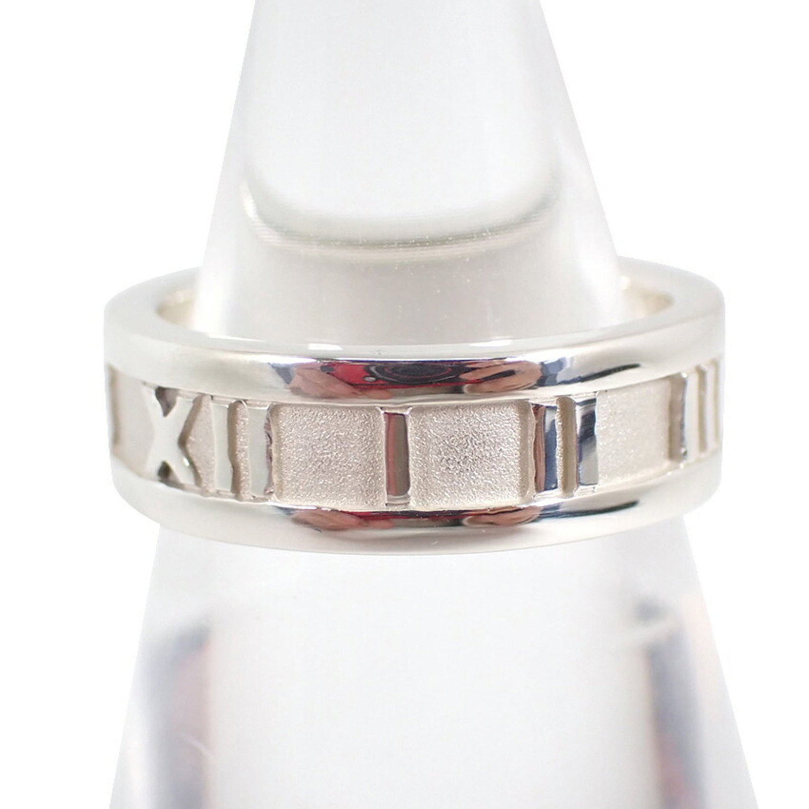 Sterling Silver Ring Tiffany Band: Sterling Silver Ring Tiffany Band Sterling Silver Ring Tiffany Band - A Pre-Owned Women's Band in Excellent Condition. This 50mm sterling silver band features the iconic Tiffany brand and has a few