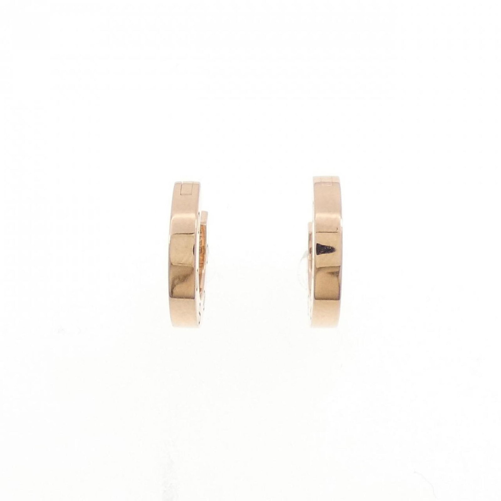 Pink Gold 18K Cartier Earrings Stud: Pink Gold 18K Cartier Earrings Stud Pink Gold 18K Cartier Earrings Stud - A beautiful, used pair of stud earrings in pink gold (18K) that showcases the iconic style of Cartier. With a few traces of
