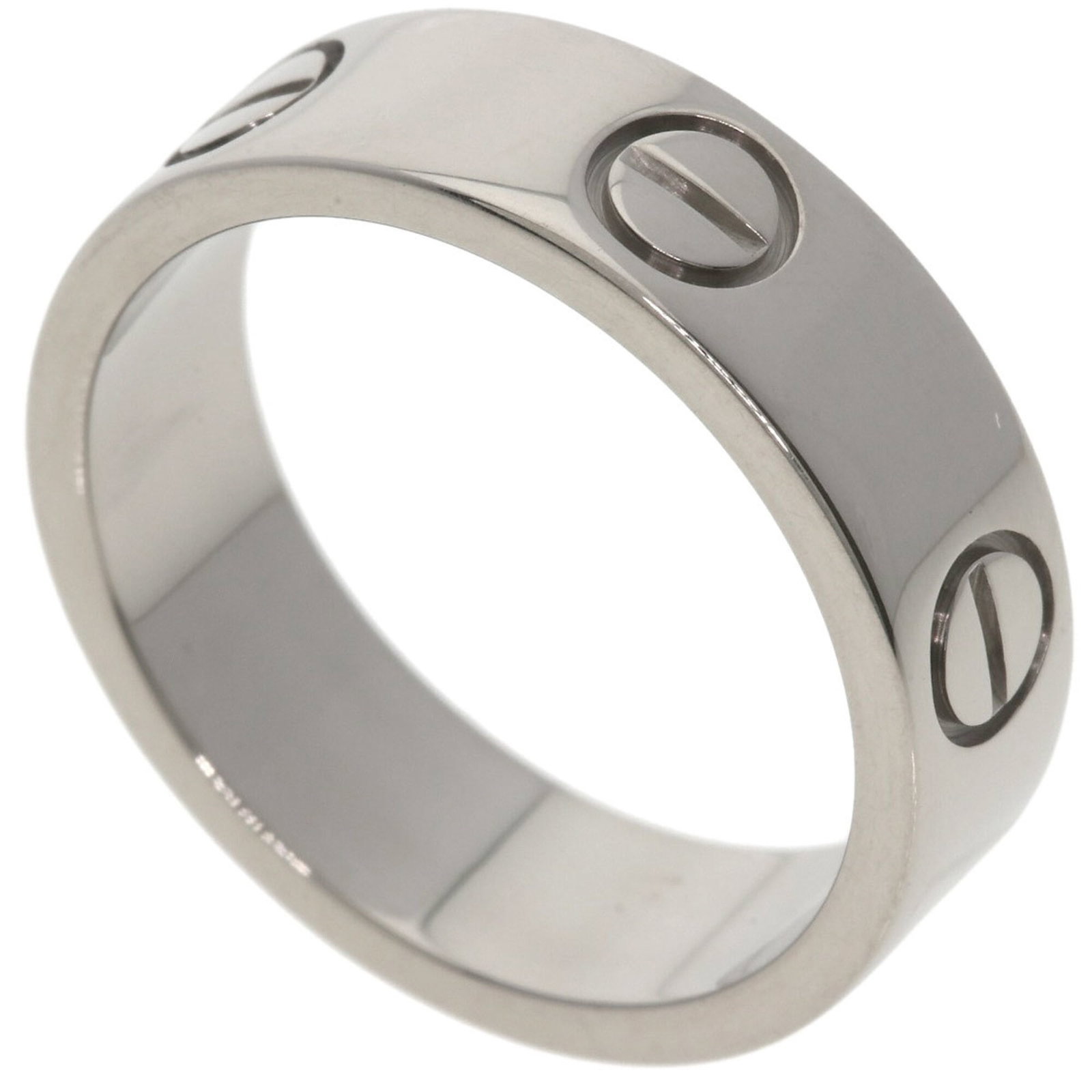 Cartier Band Ring: Cartier Band Ring Cartier Band Ring in excellent condition, featuring an 18K white gold band with a subtle width of 5.5mm. The ring bears minor signs of usage, including some scratches and dirt, but