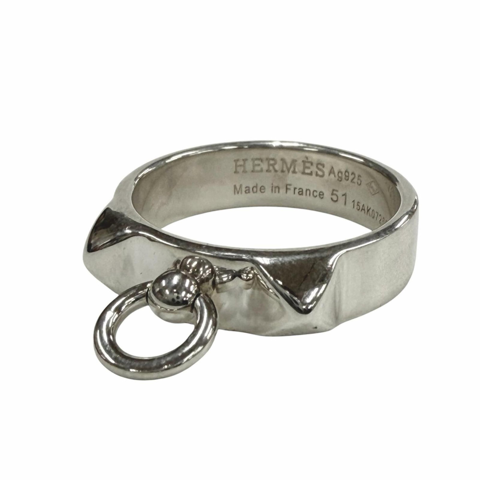 Ring Hermes Silver Band 925: Ring Hermes Silver Band 925 Silver band ring from Hermes, made from high-quality silver (925), with a sleek design and slender width of 5mm. This stylish accessory features a classic look that suits b